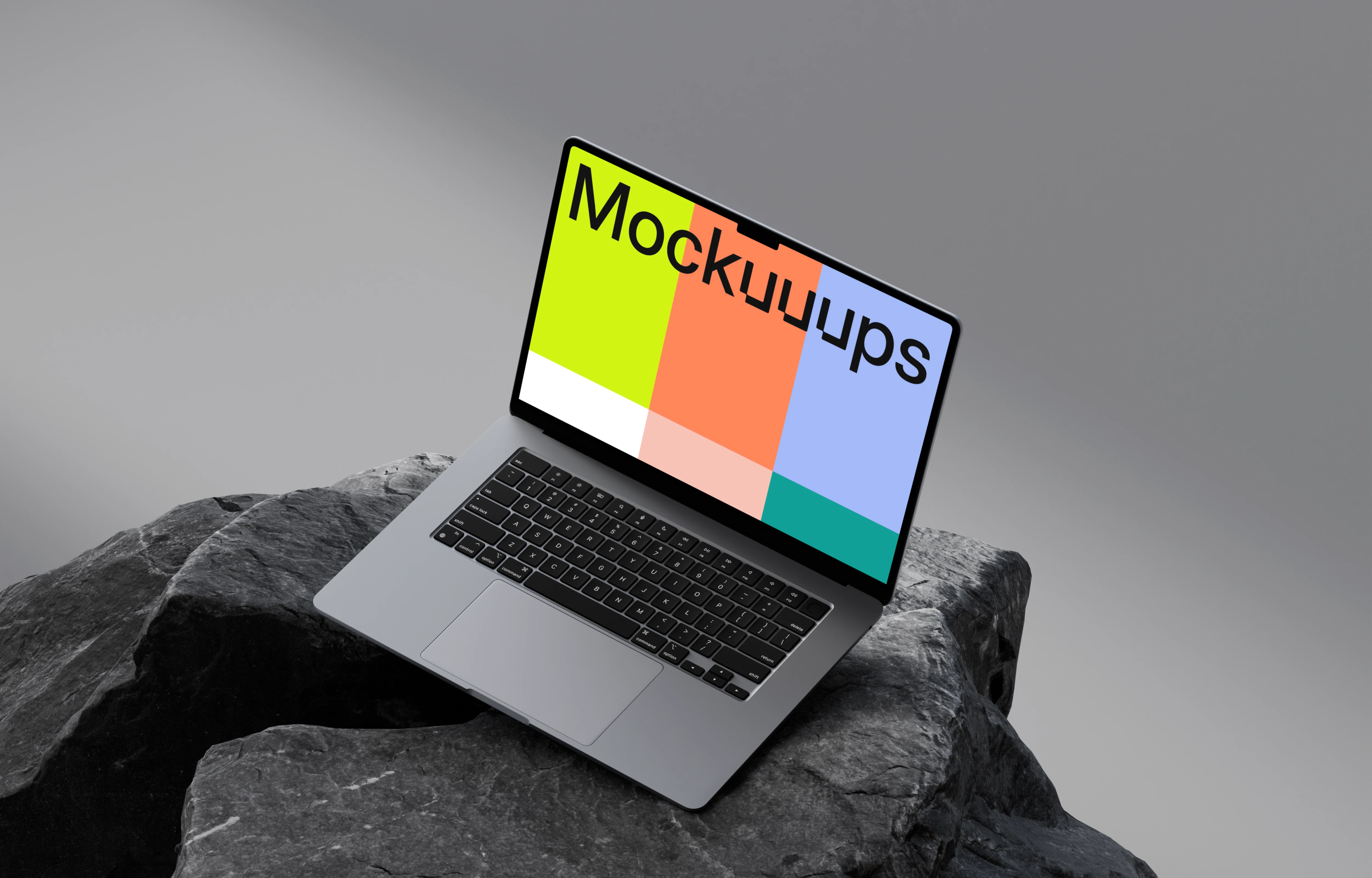 Free MacBook Air 15" mockup on dark textured rocks