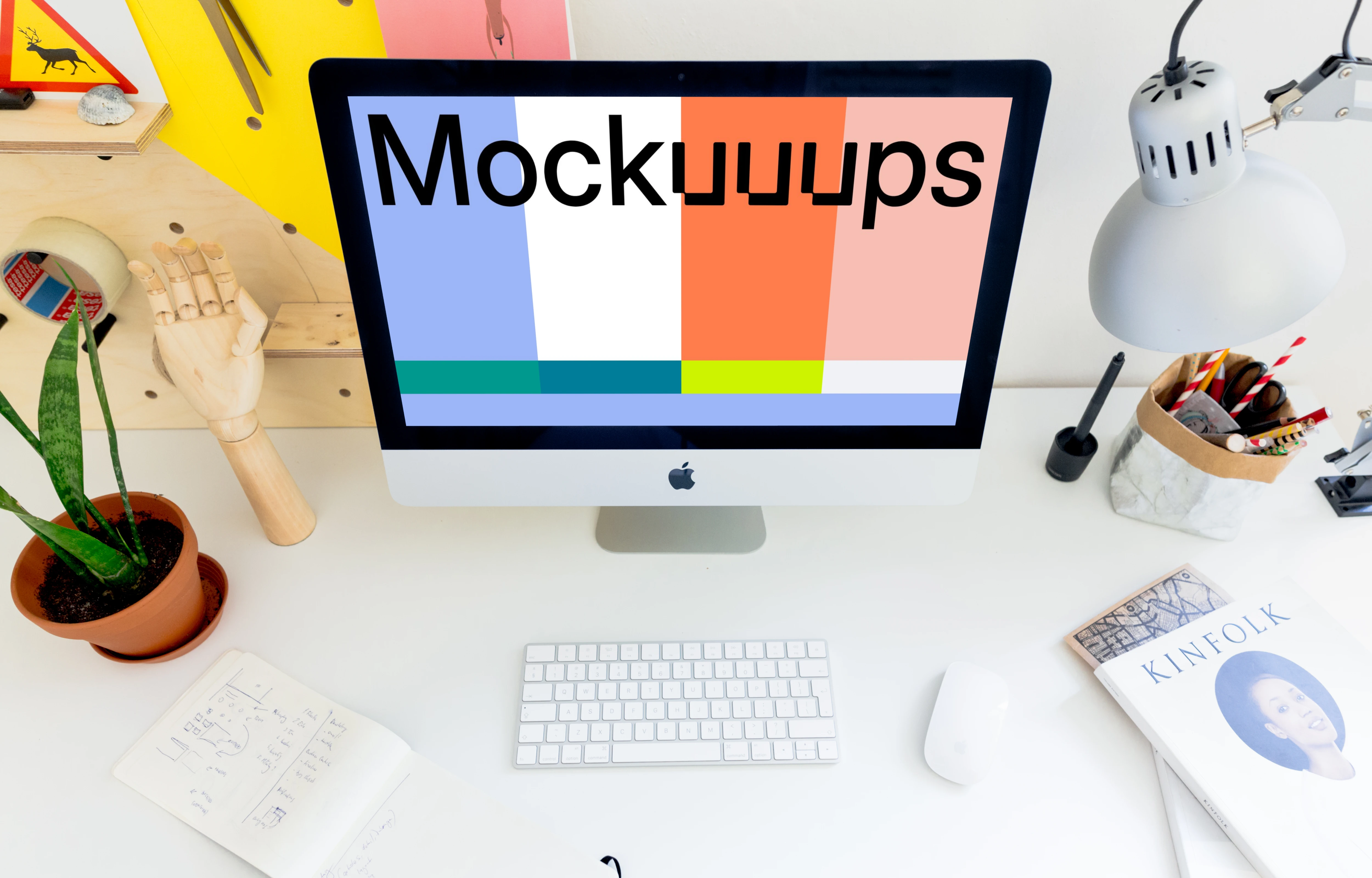 Perspective mockup of iMac on the white desk