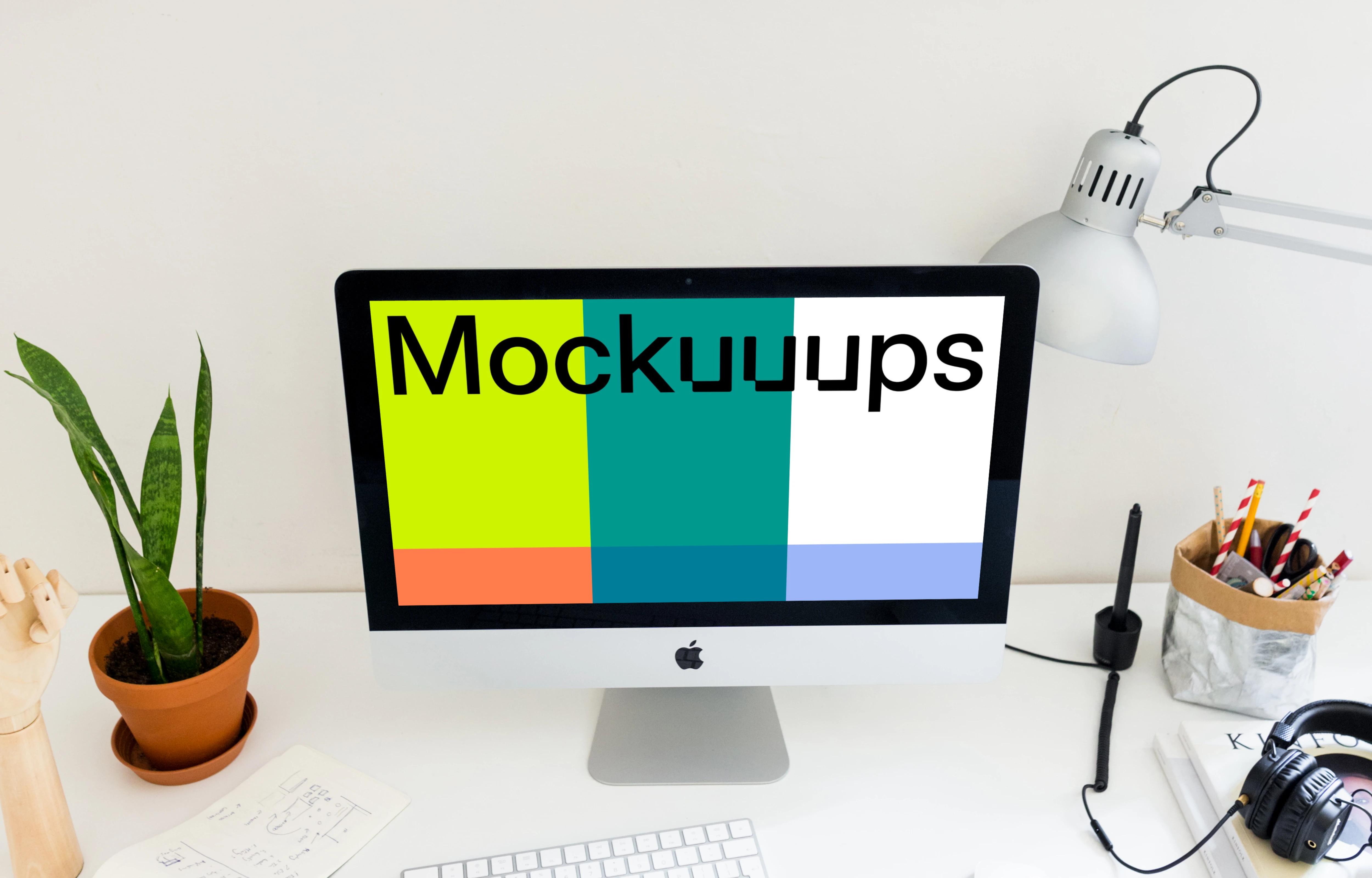 Perspective view of iMac mockup in the office