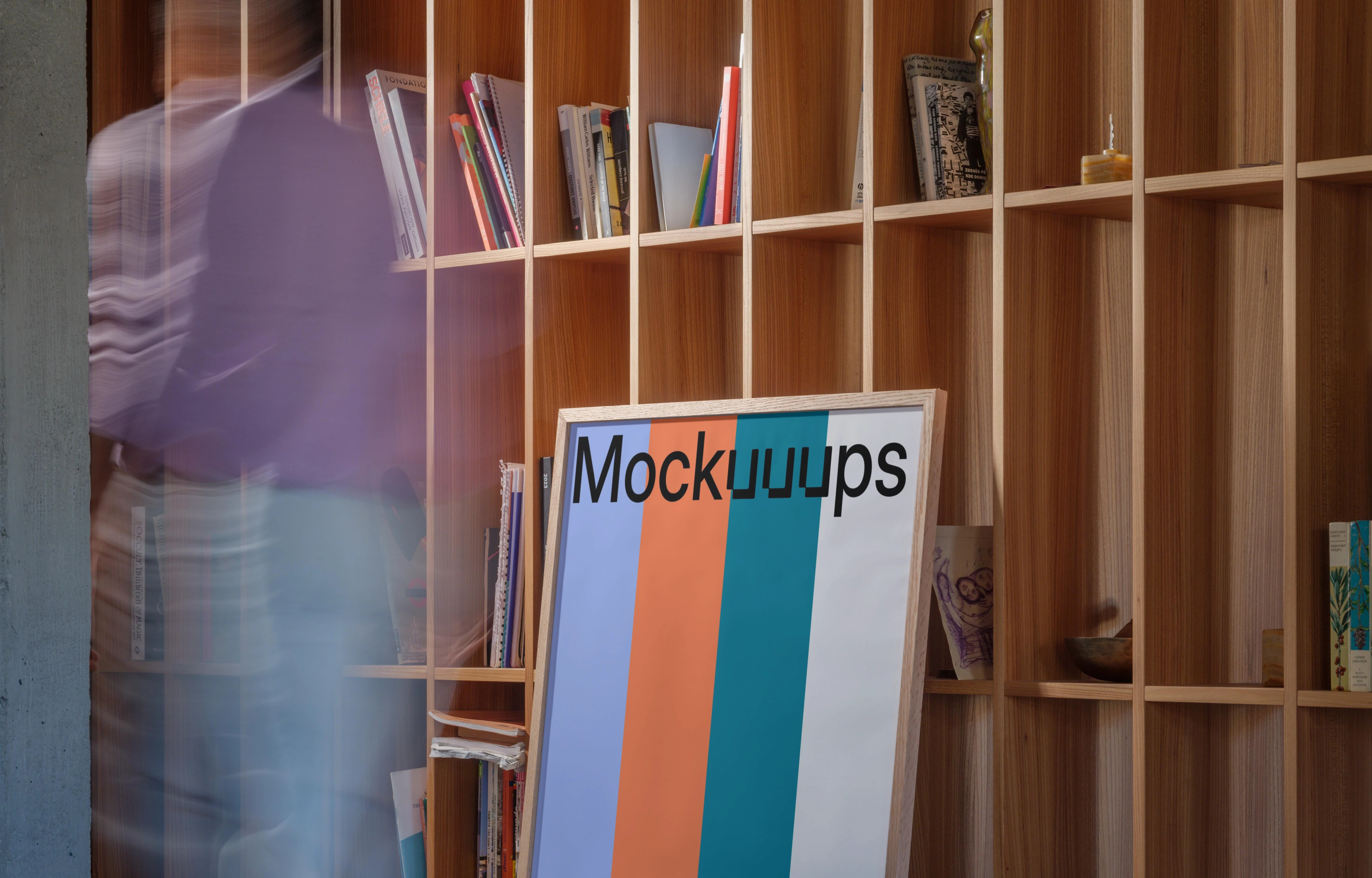 Poster mockup leaning against a wooden bookshelf