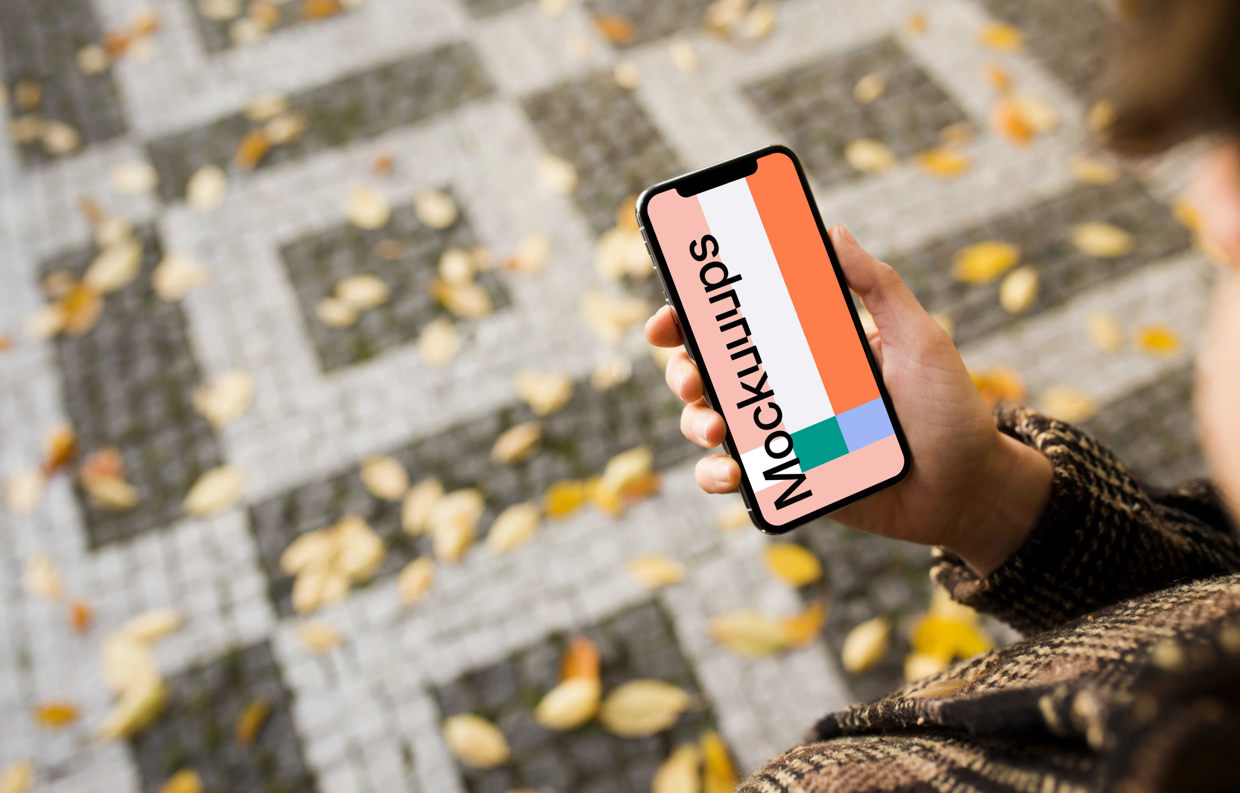 Reading and walking down the street with iPhone X mockup