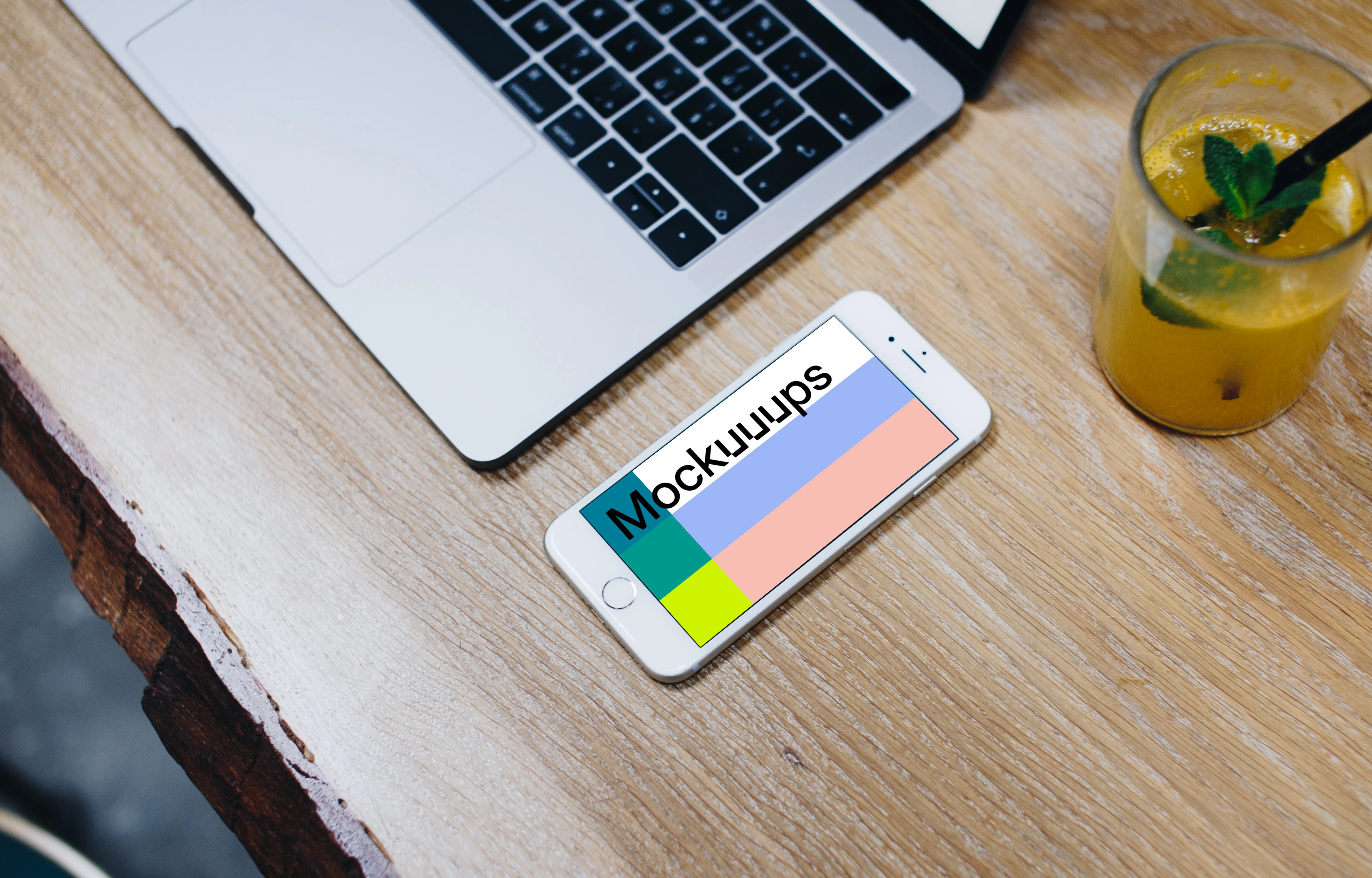 Silver iPhone 7 mockup on the wooden table