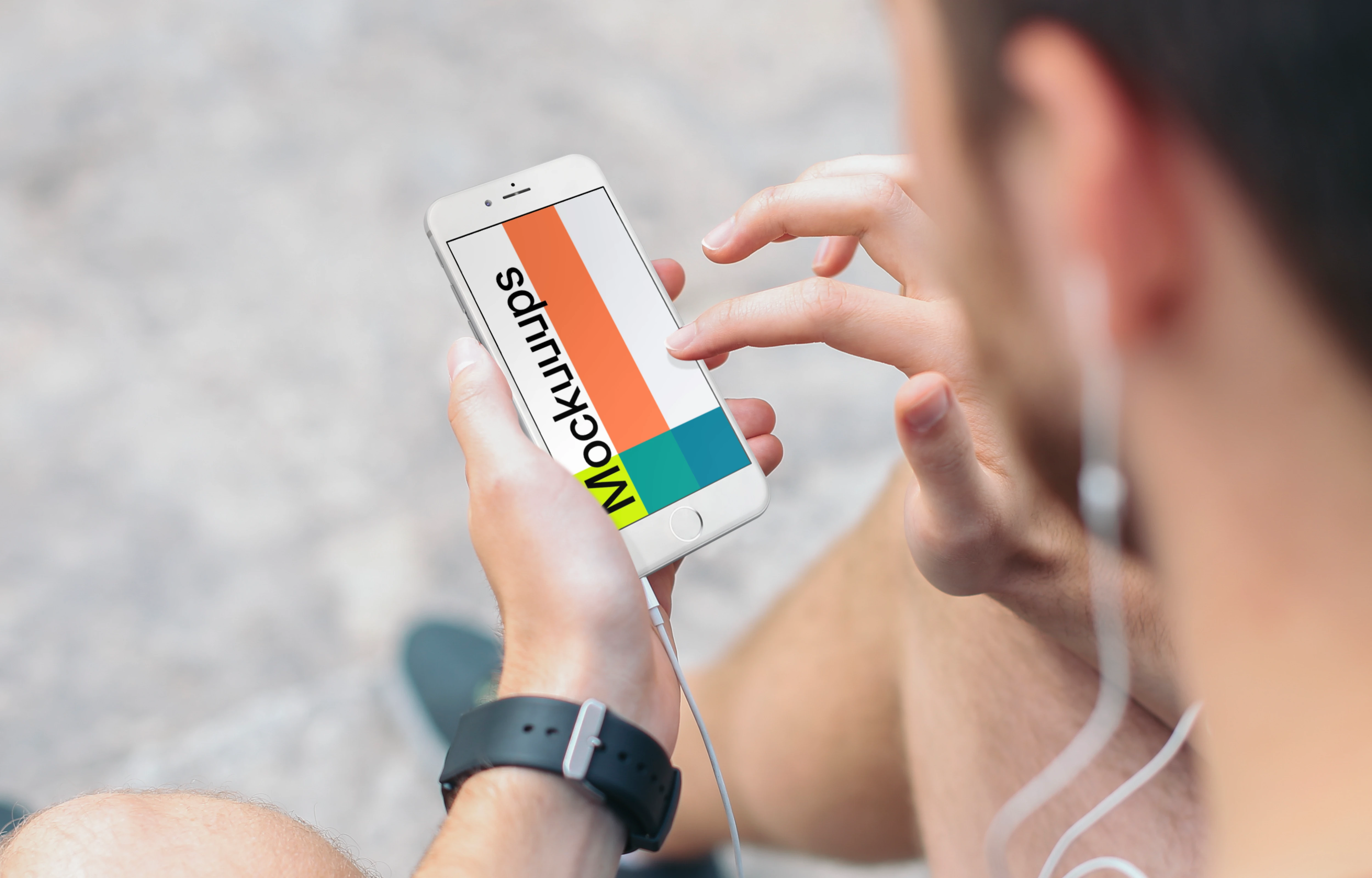 Sitting on Stairs with iPhone 6s mockup and Headphones