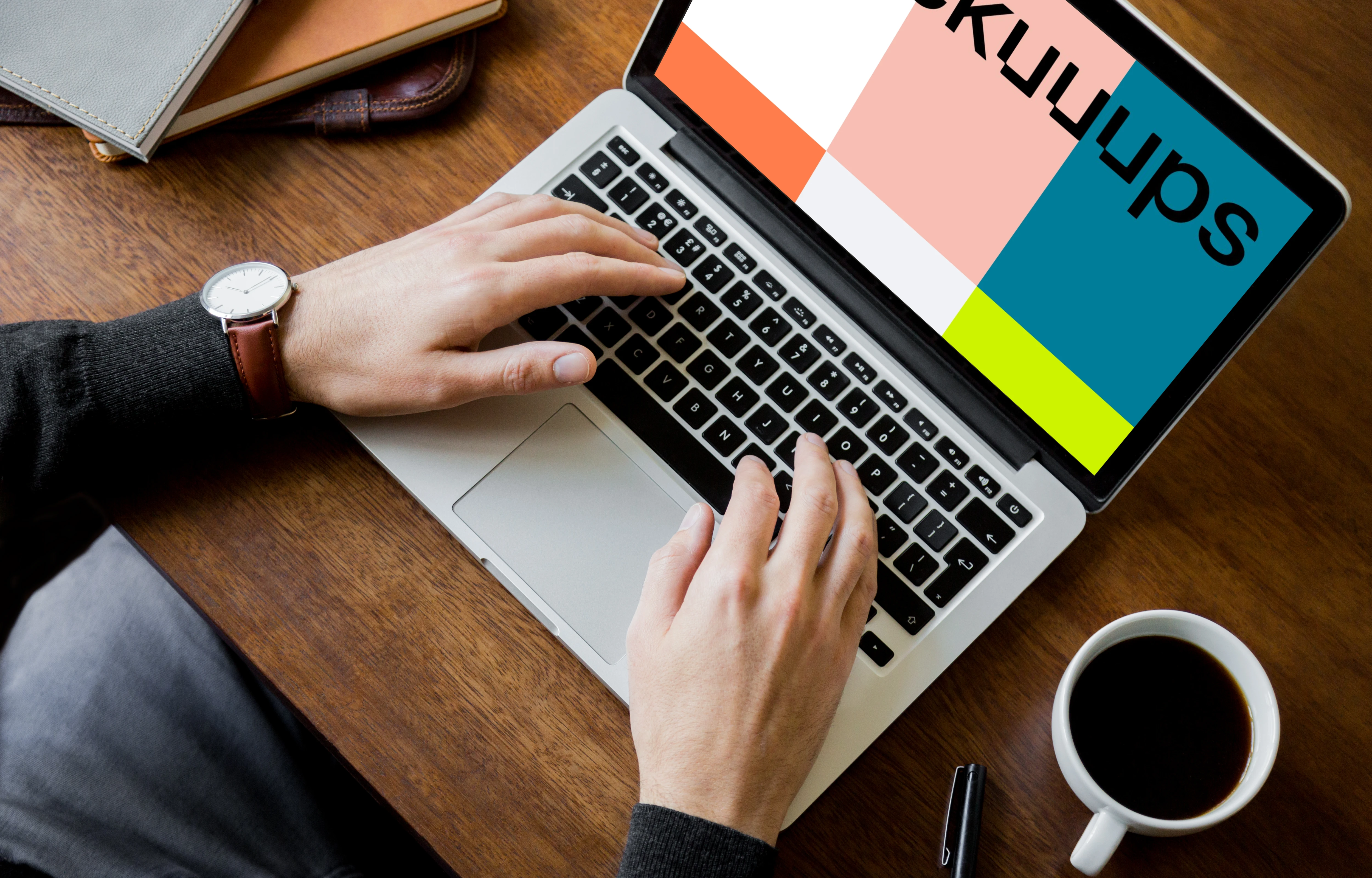 Sitting with coffee and working on Macbook Pro mockup