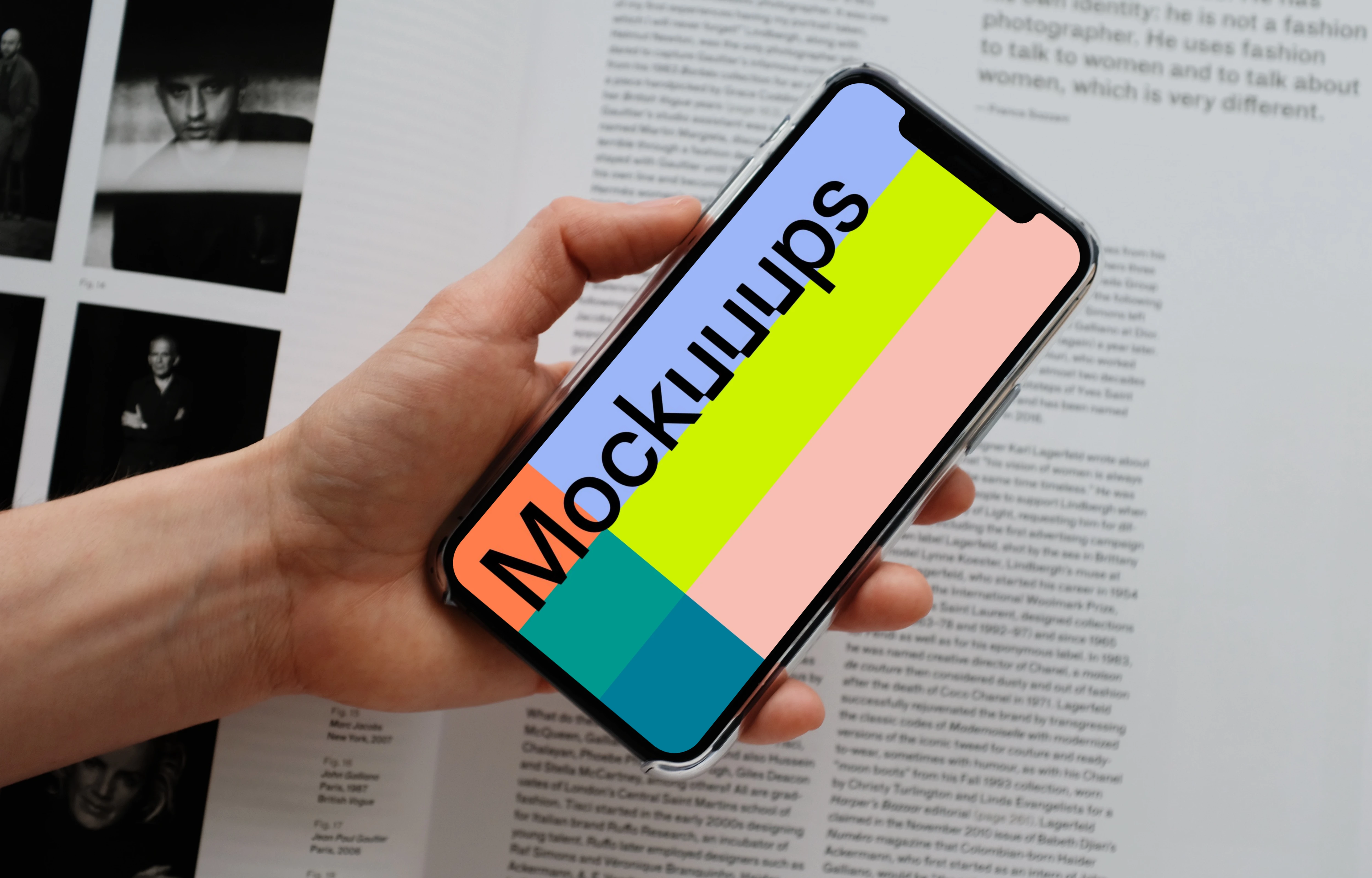 iPhone 12 Pro mockup held by user over an open magazine