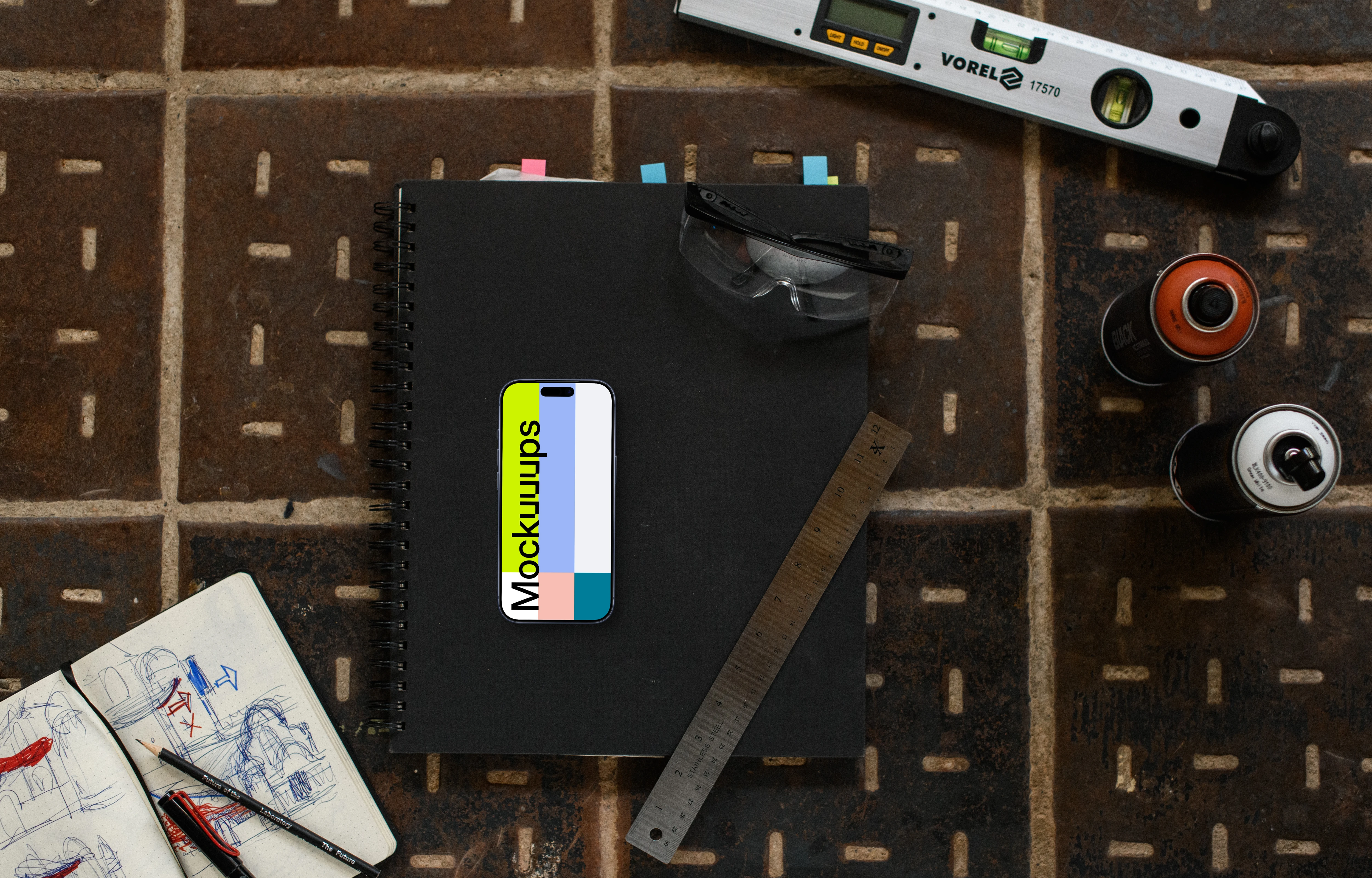 Smartphone mockup with architect tools and sketches