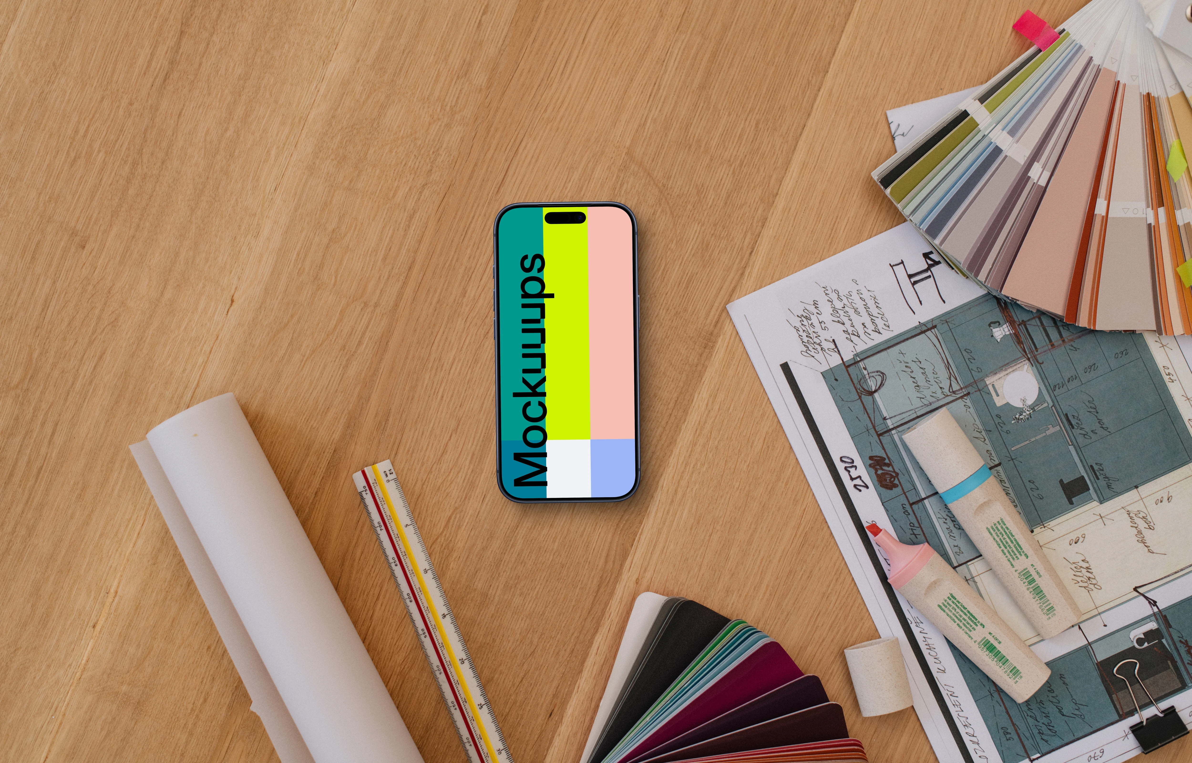 Smartphone mockup with architectural plans and color swatches