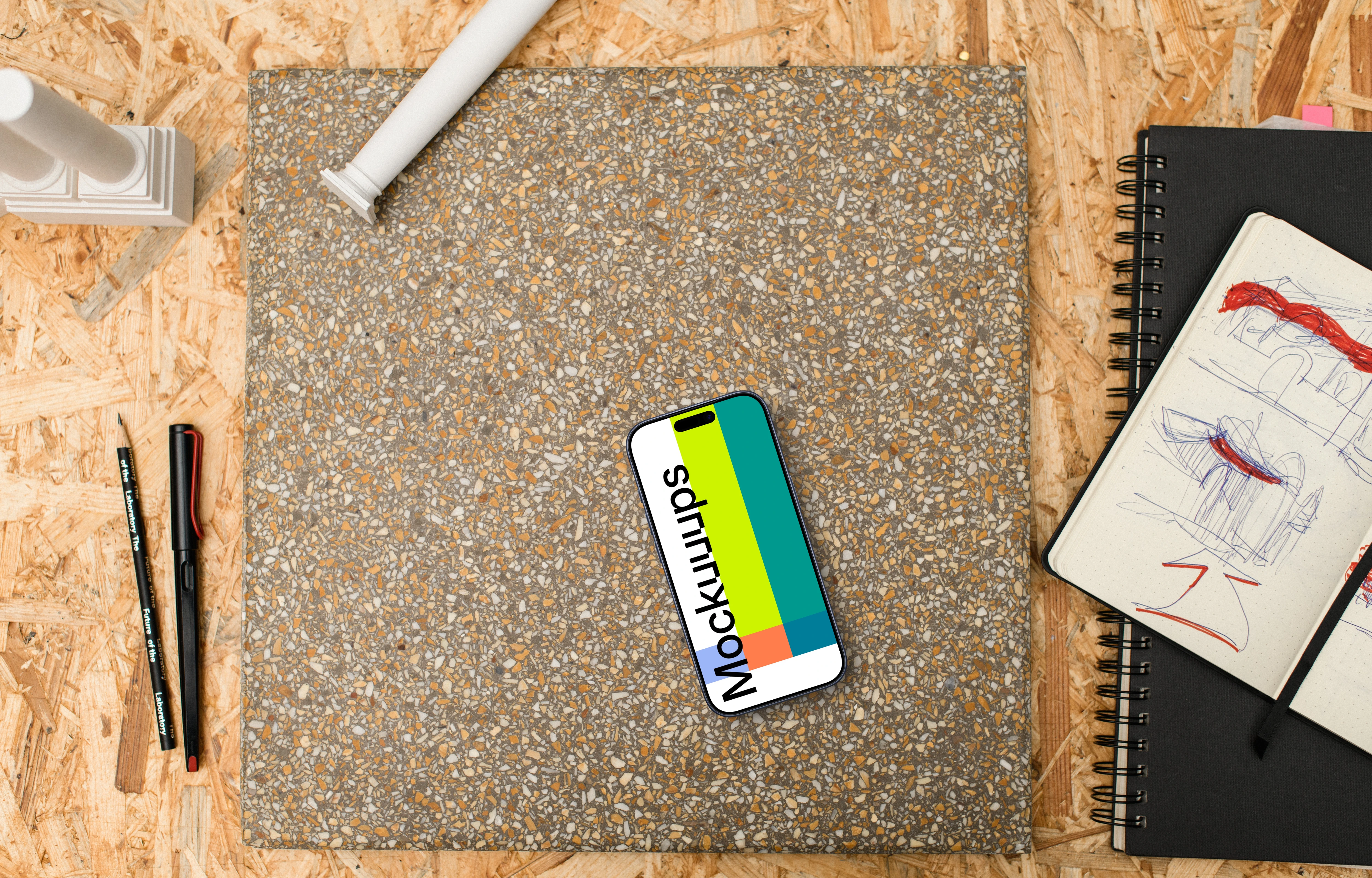 Smartphone mockup with architectural sketching supplies