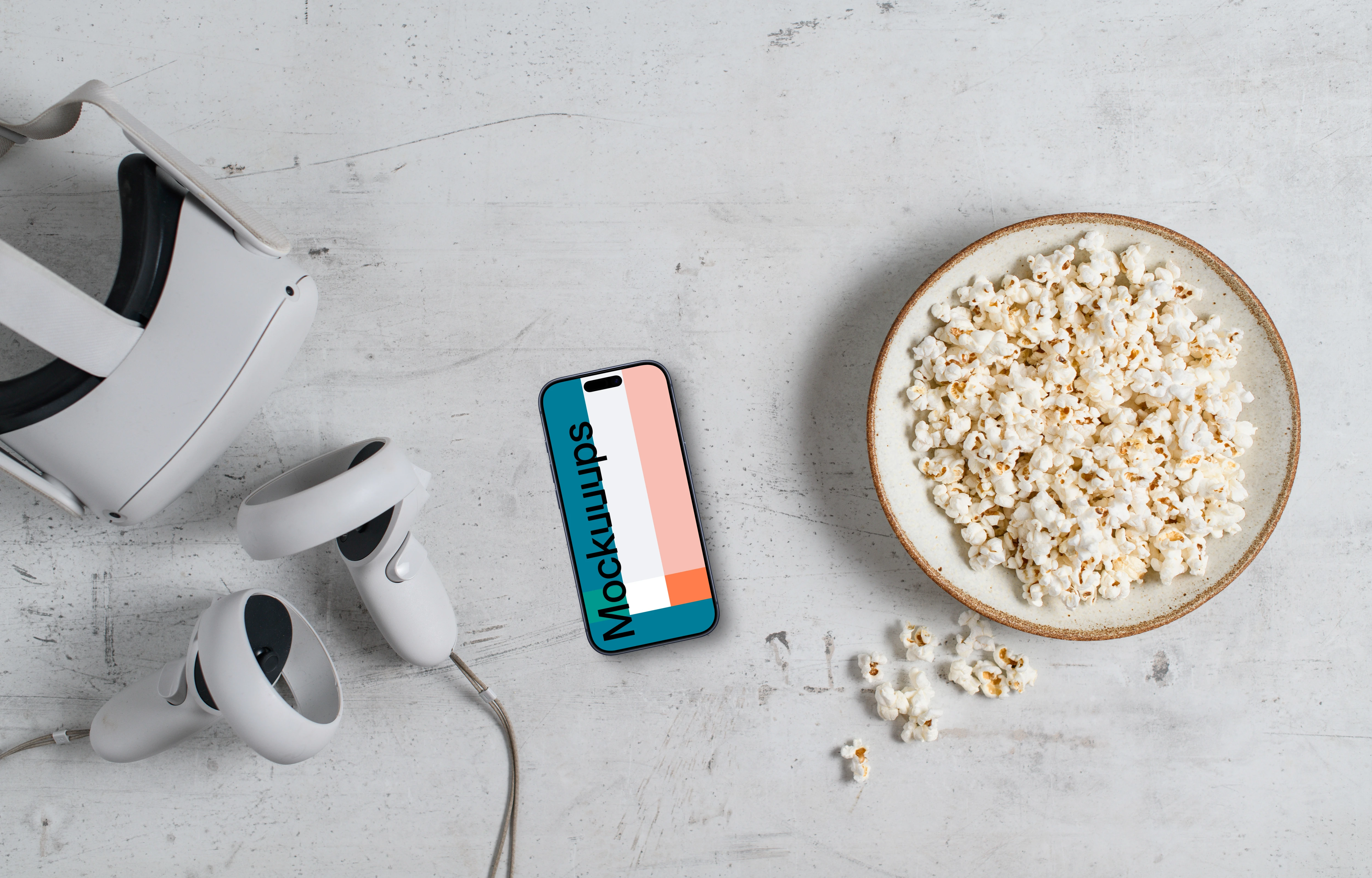 Smartphone mockup with VR headset and gaming accessories