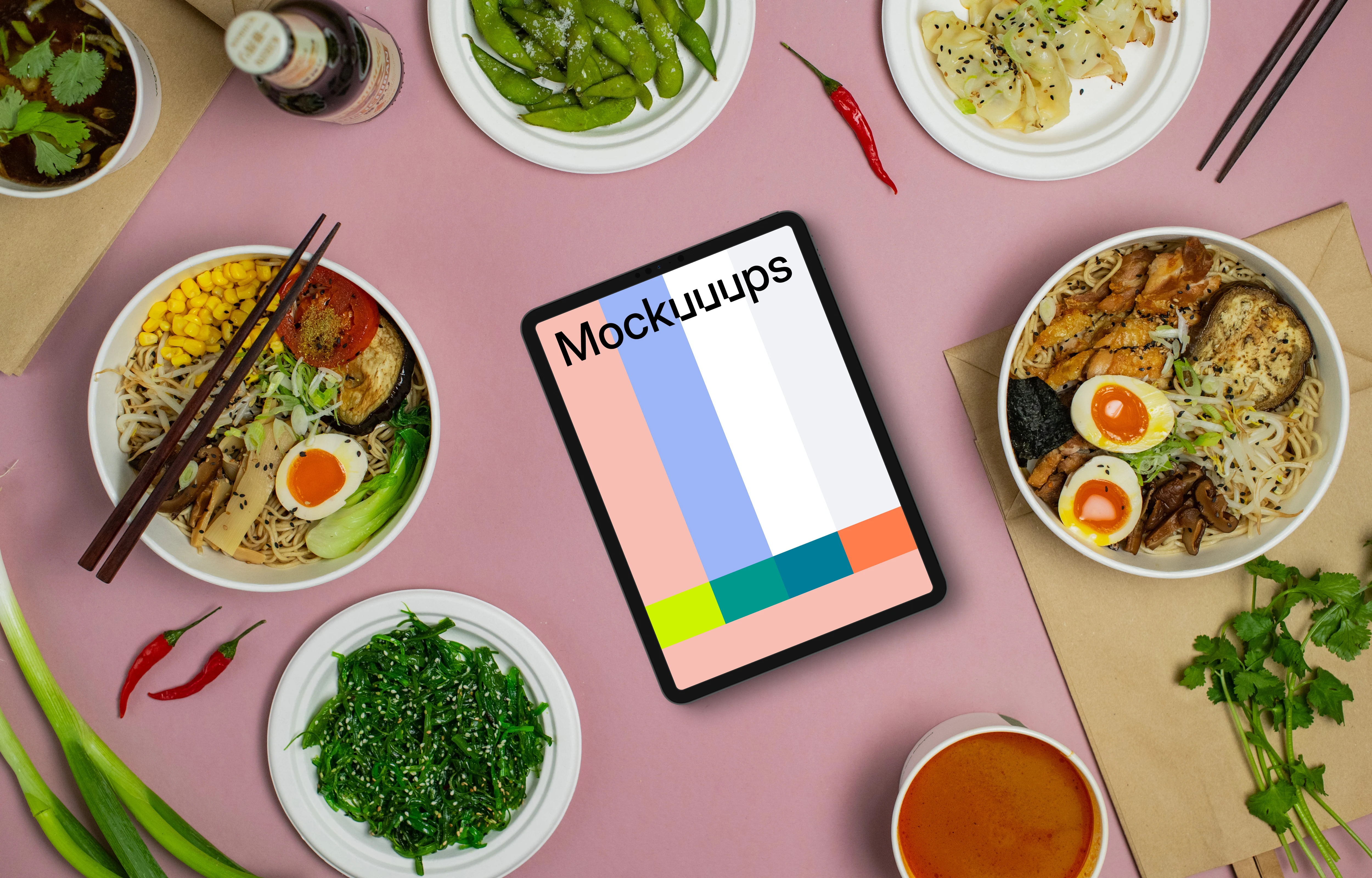 Tablet mockup between Japanese food