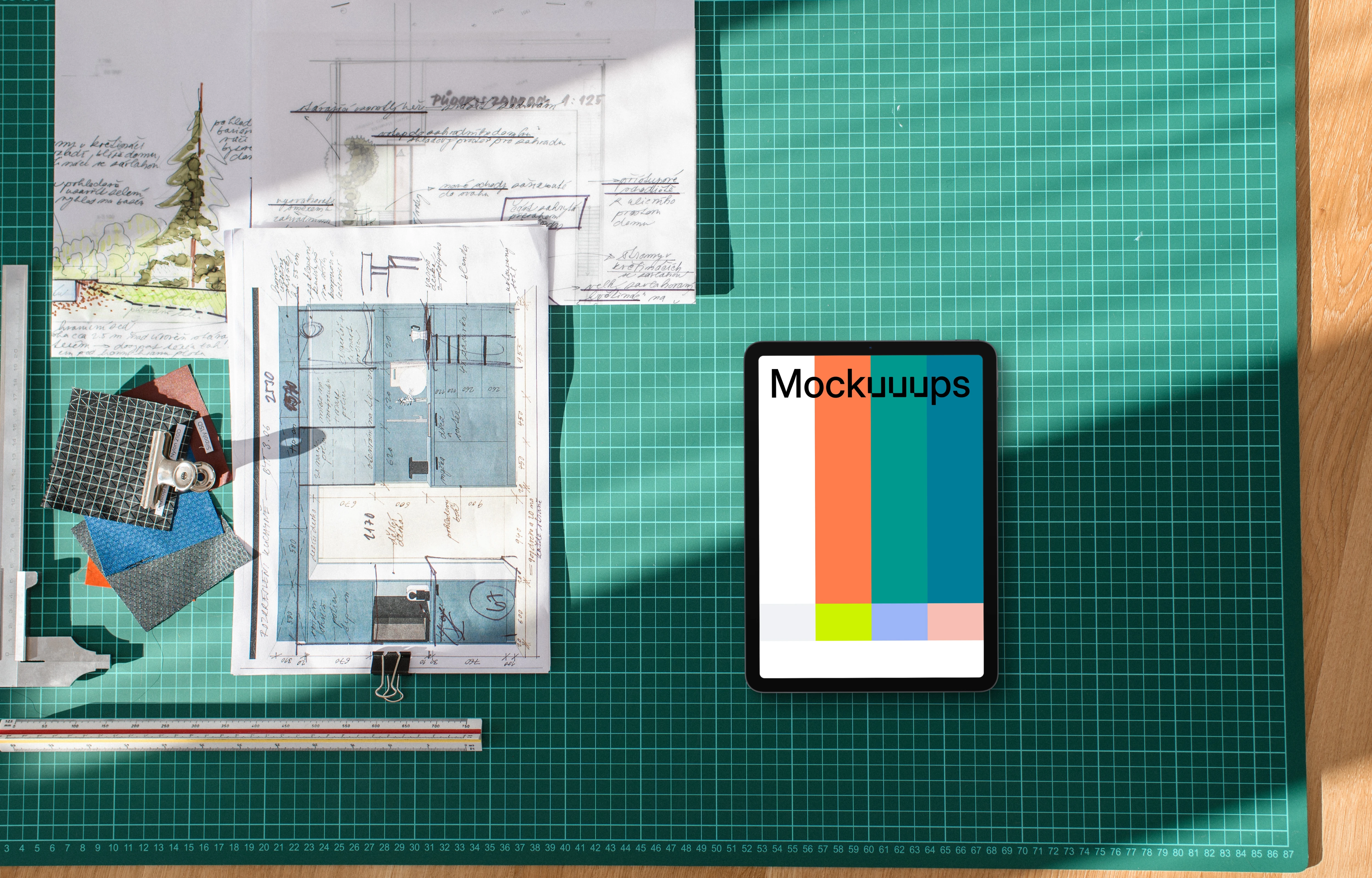 Tablet mockup on architect's workspace