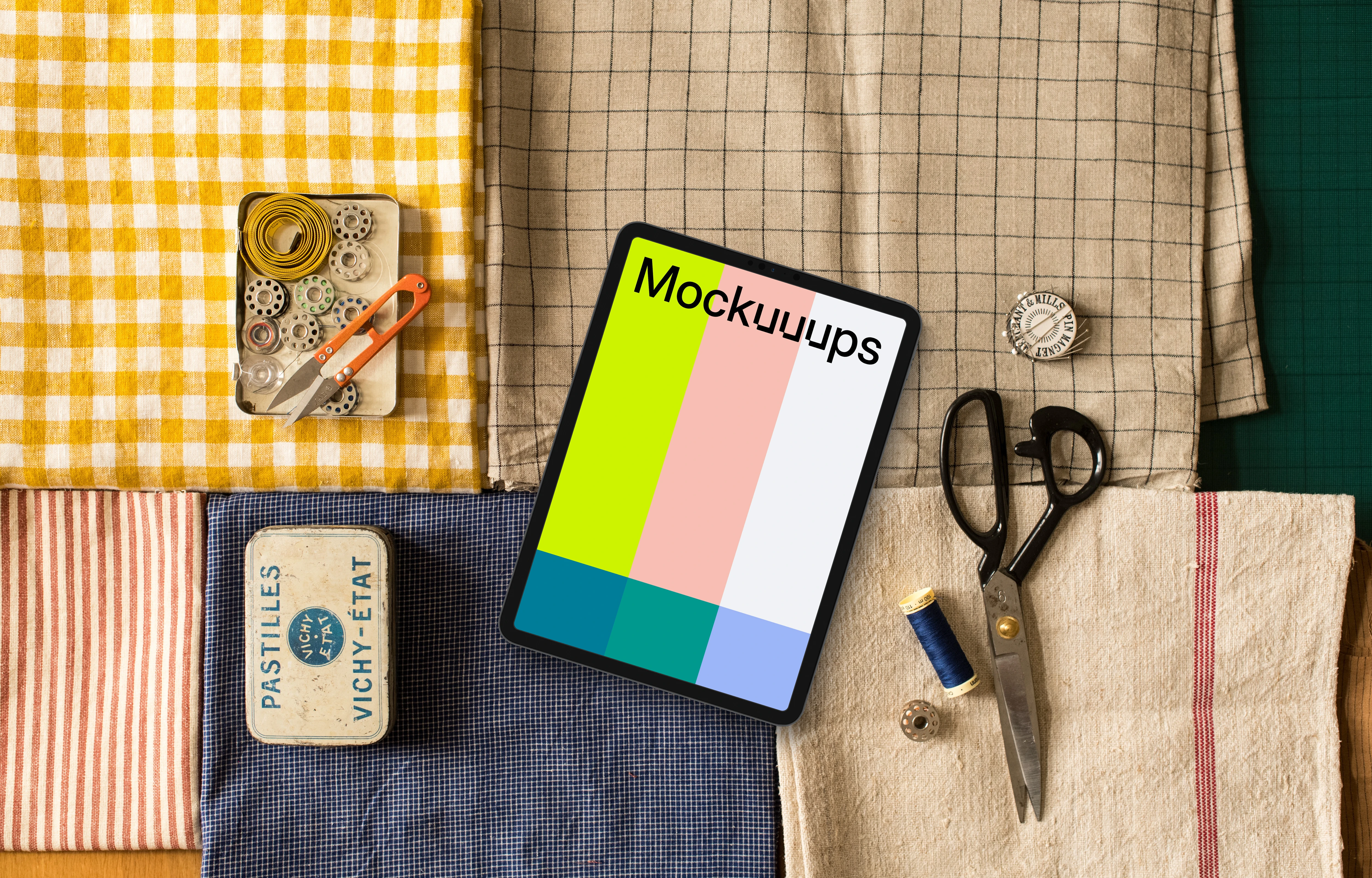 Tablet mockup on folded cloths