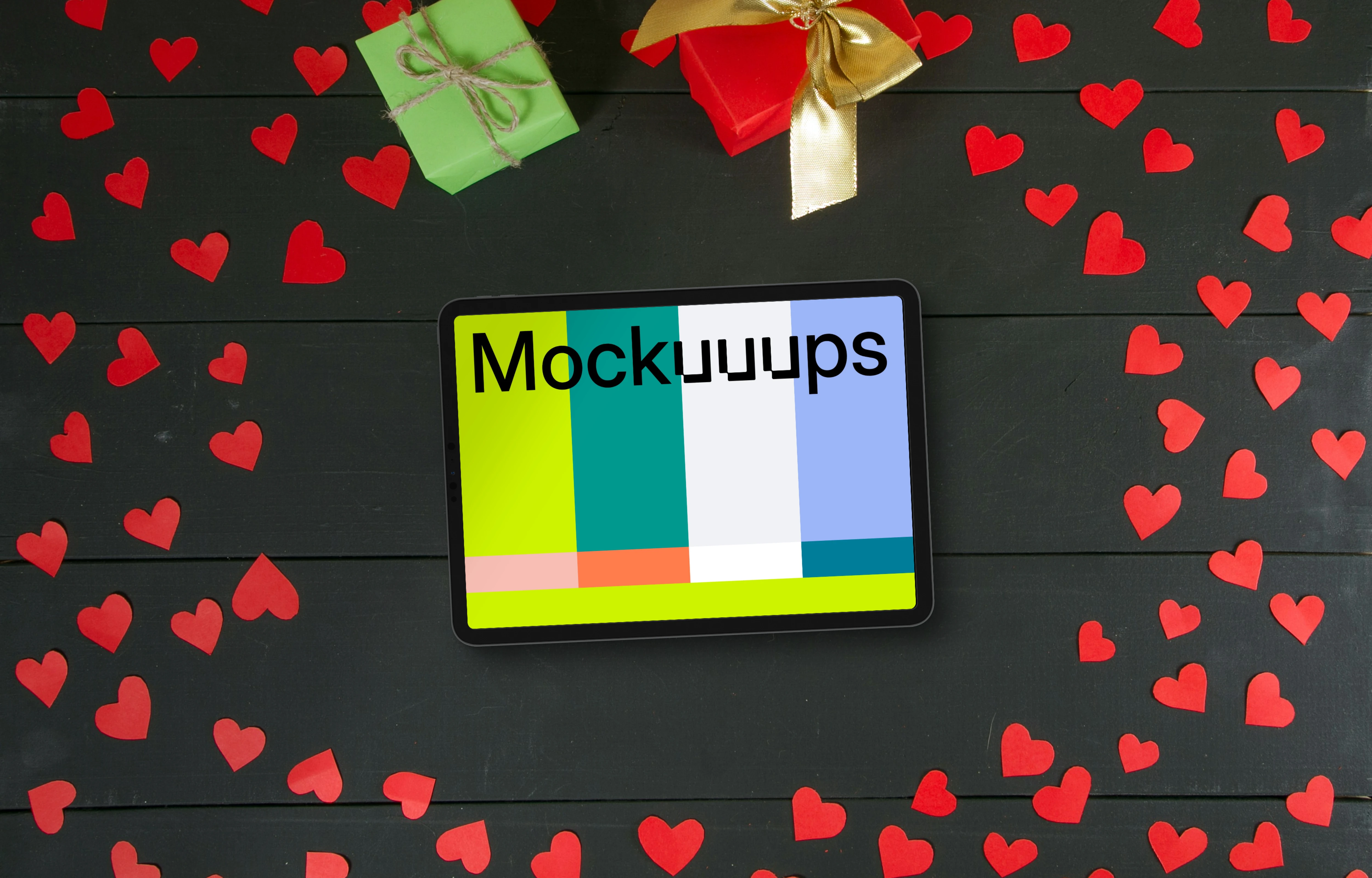 Tablet mockup surrounded by hearts and gifts