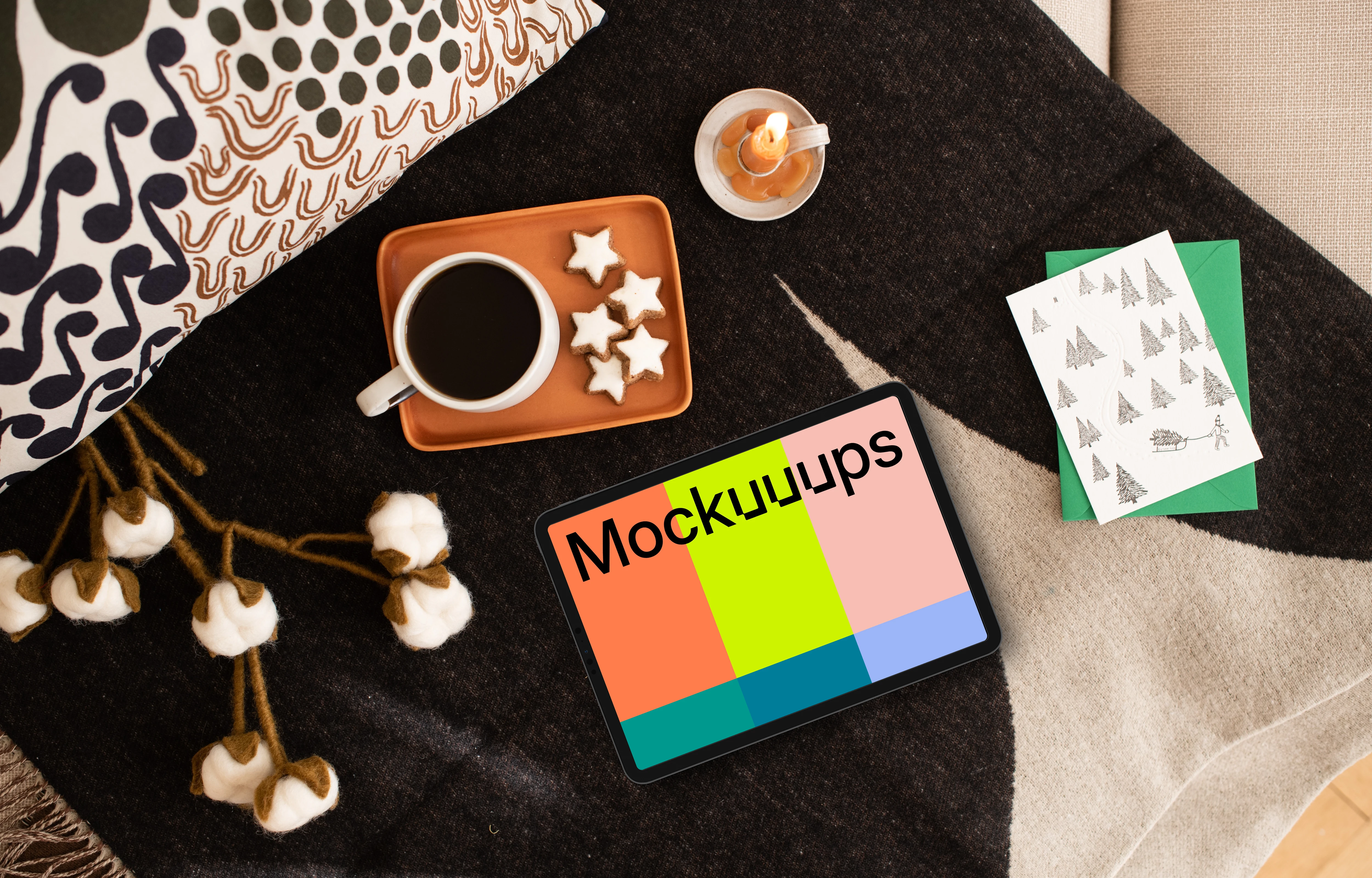 Top view of tablet mockup with Xmas design