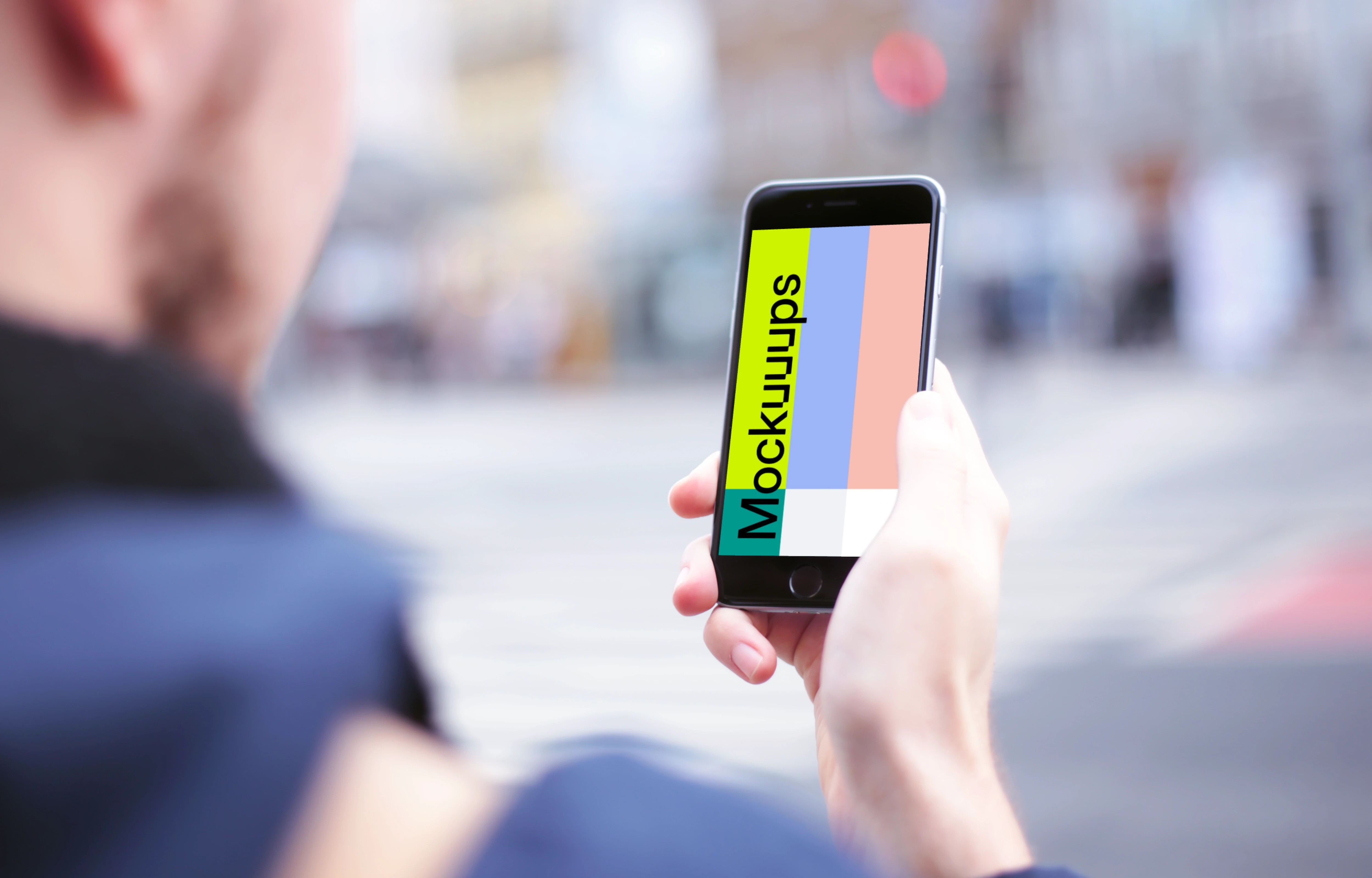 Waiting with iPhone 6 mockup on crosswalk