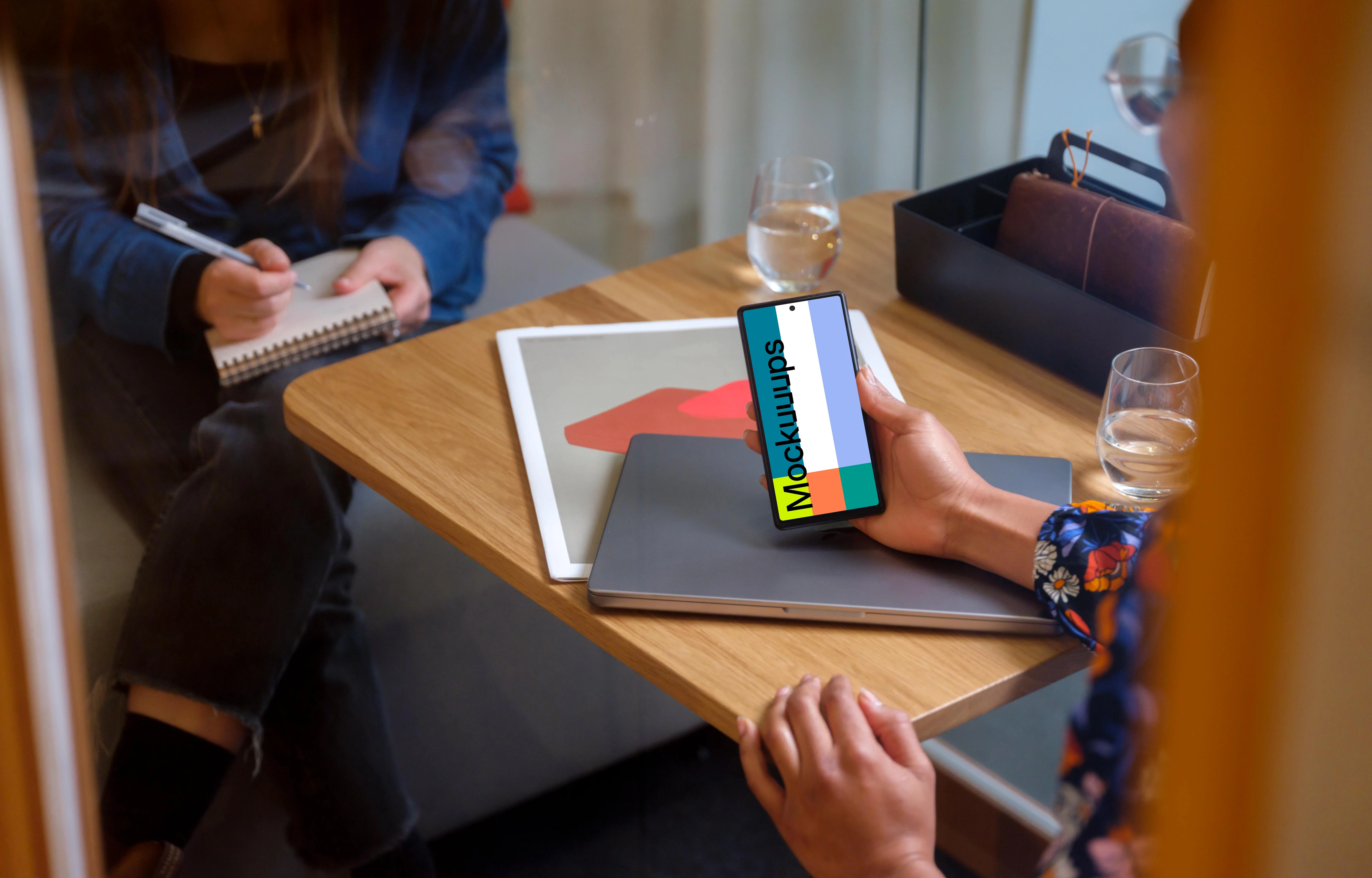 Woman holding a Google Pixel mockup
