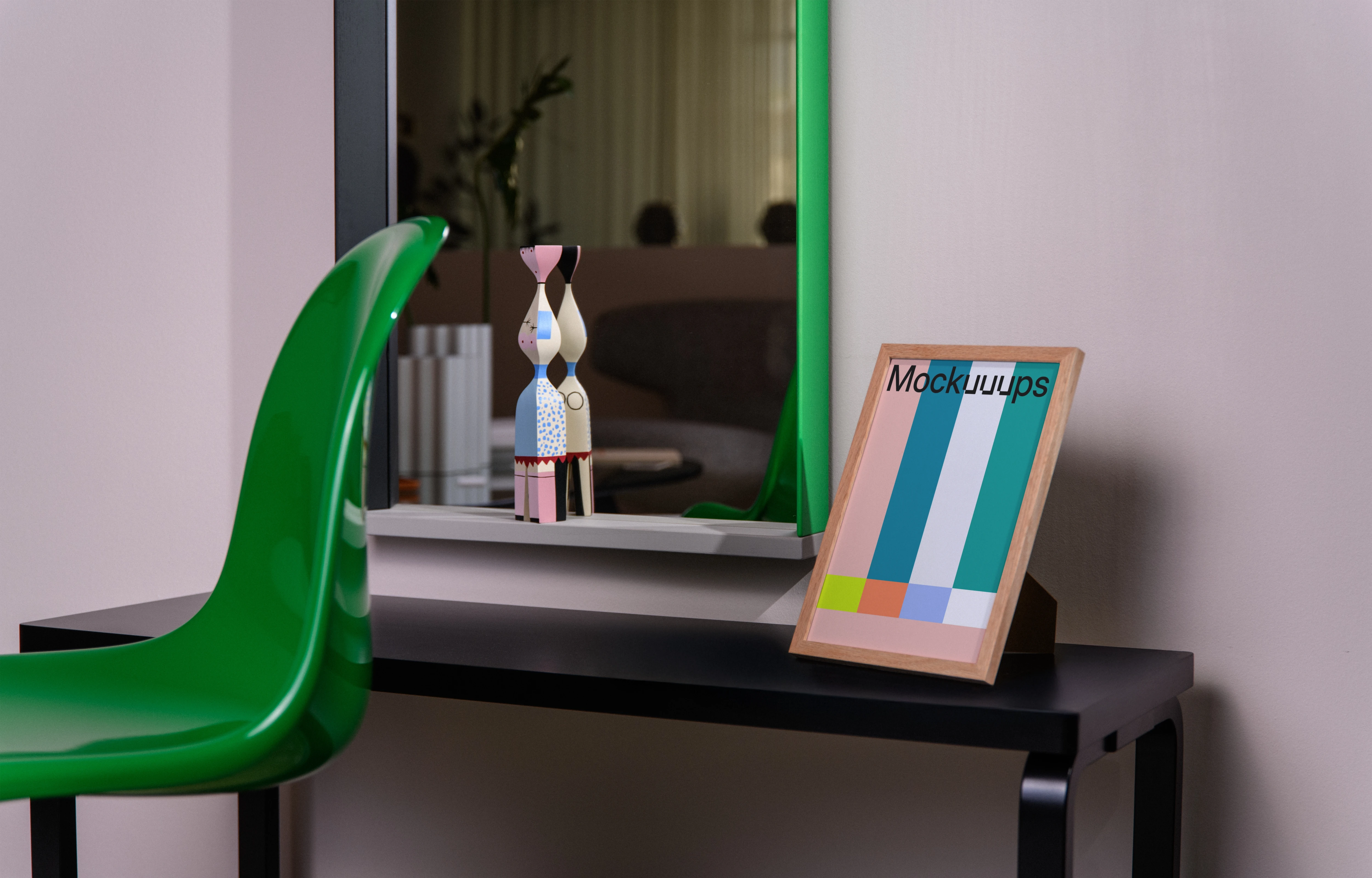 A5 frame mockup on a black desk with decor and mirror