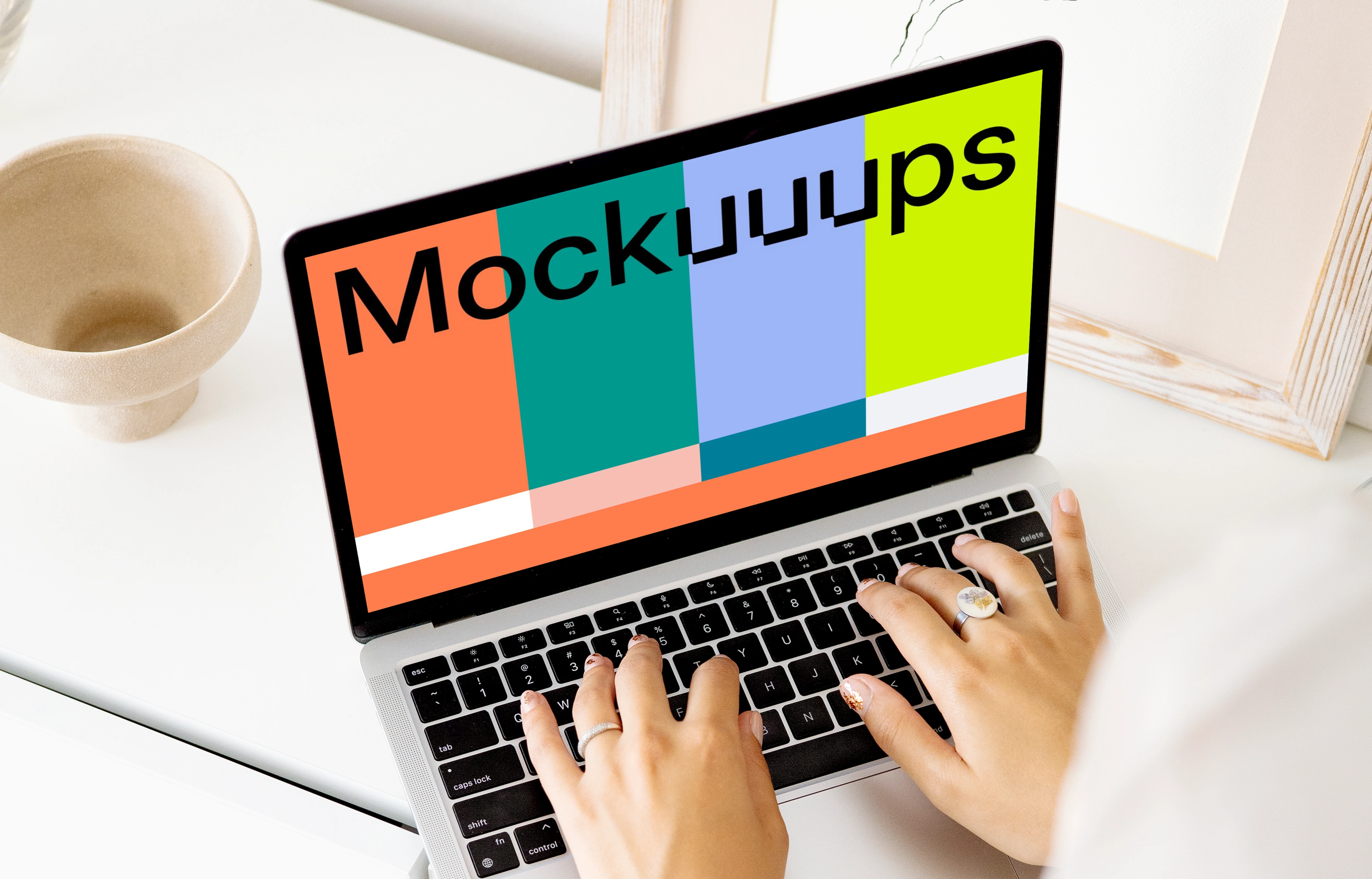 Young lady typing on a MacBook Pro mockup