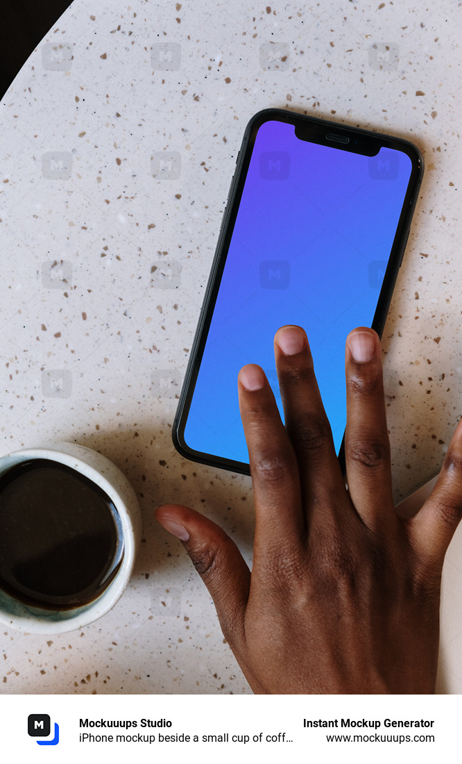 iPhone mockup beside a small cup of coffee