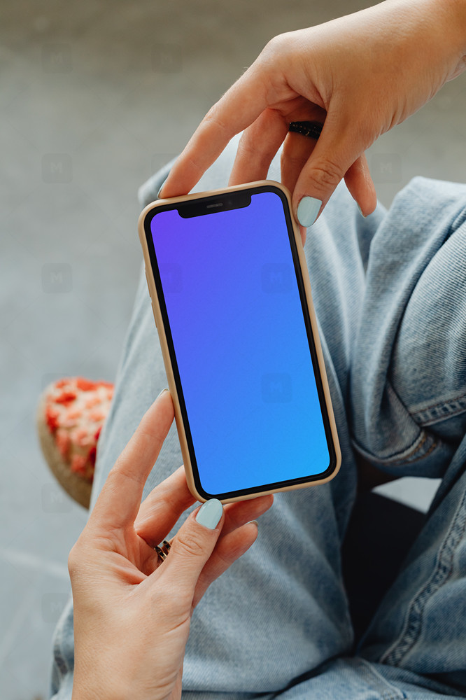 Woman hands holding iPhone Mockup