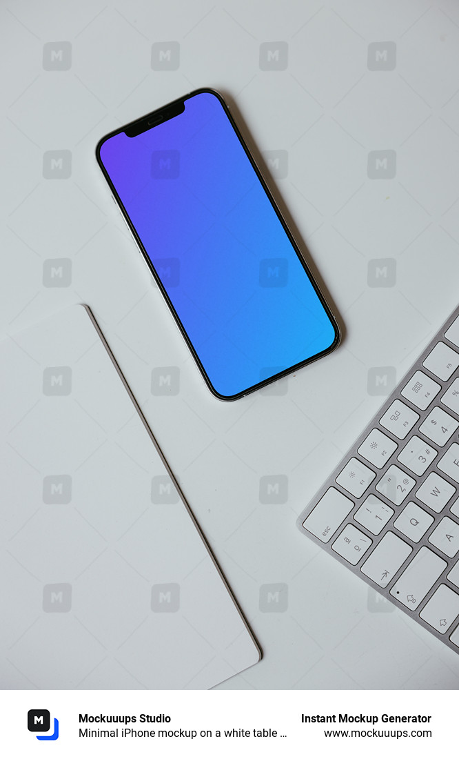 Minimal iPhone mockup on a white table with a wireless keyboard by the side