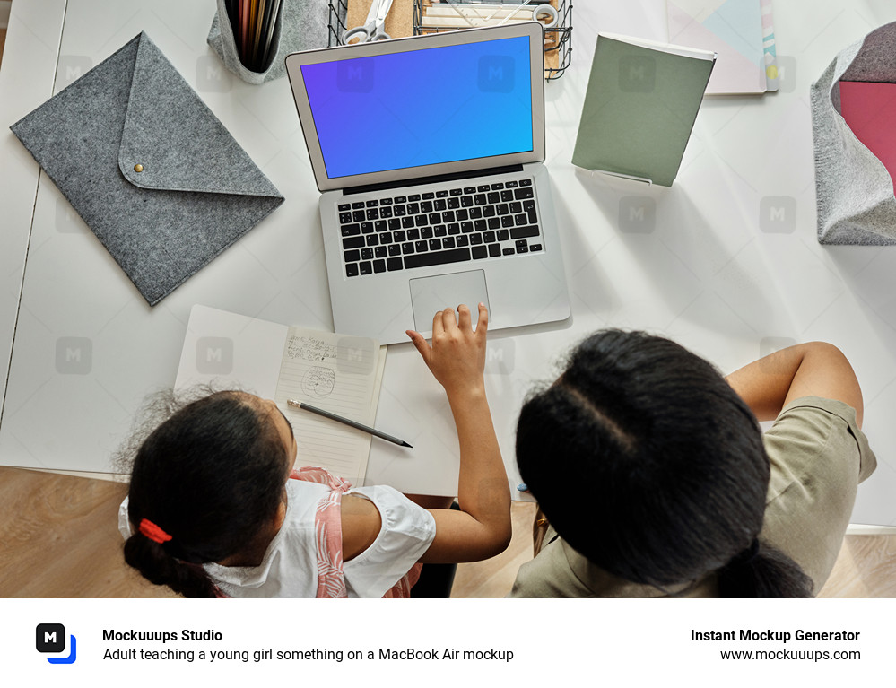 Adult teaching a young girl something on a MacBook Air mockup