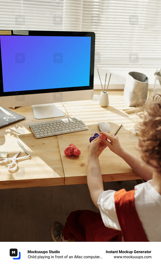 Child playing in front of an iMac computer mockup