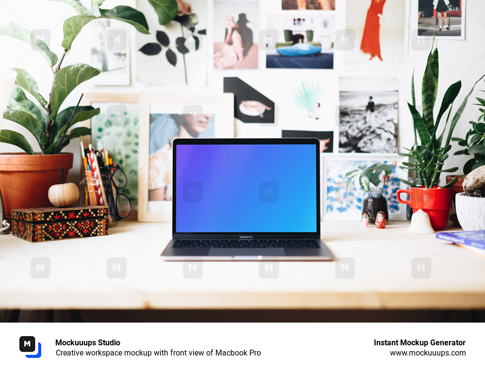 Creative workspace mockup with front view of Macbook Pro