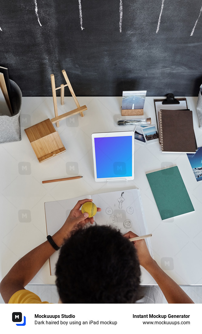 Dark haired boy using an iPad mockup