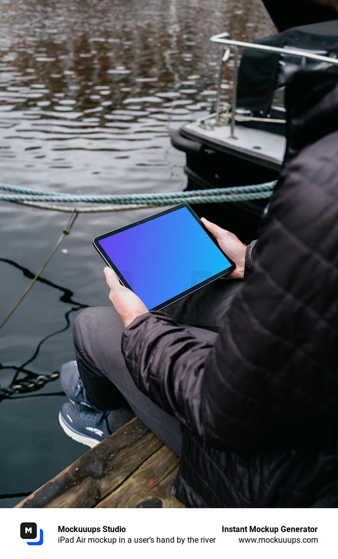 iPad Air mockup in a user’s hand by the river
