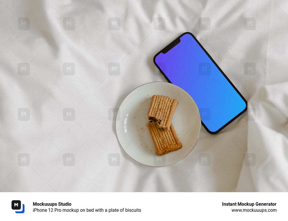 iPhone 12 Pro mockup on bed with a plate of biscuits