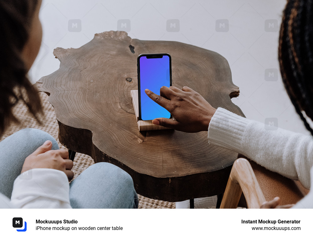 iPhone mockup on wooden center table