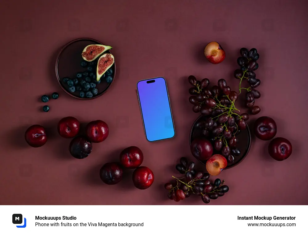 Phone with fruits on the Viva Magenta background