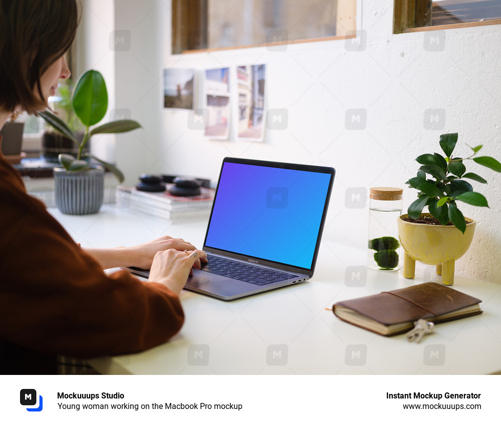 Young woman working on the Macbook Pro mockup