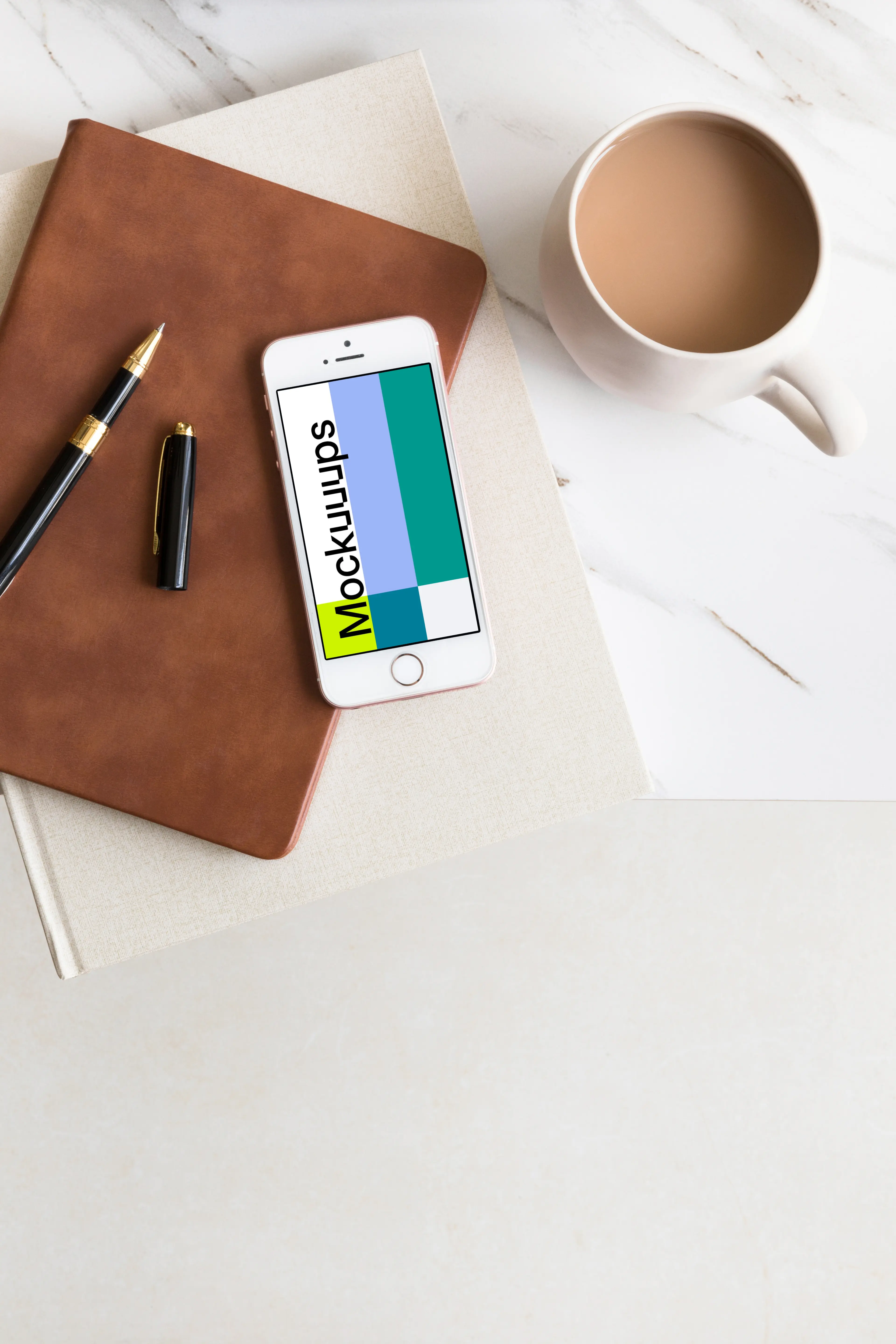 Coffee and iPhone SE mockup placed on marble table