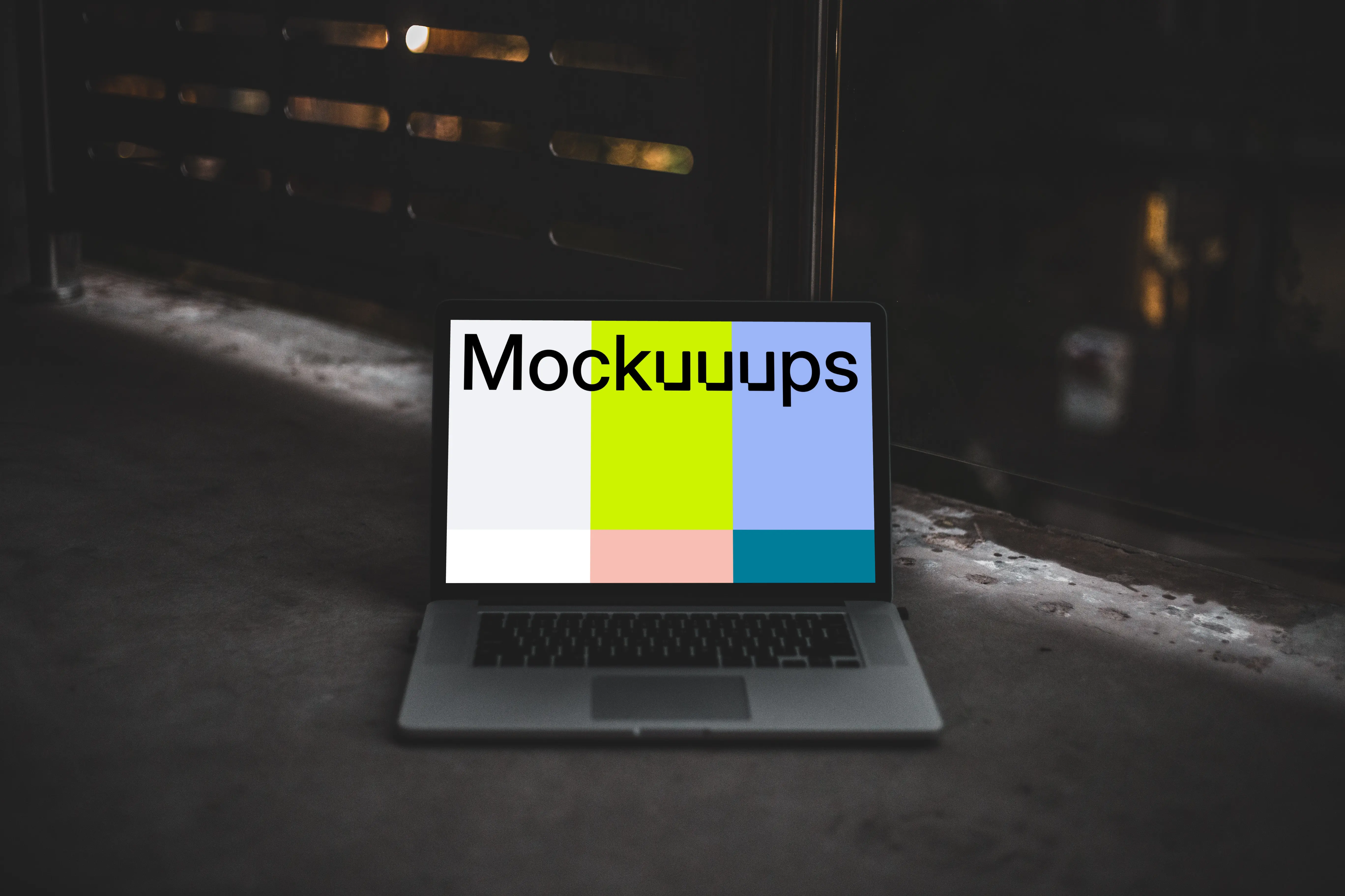 Dark mockup scene with Macbook Pro