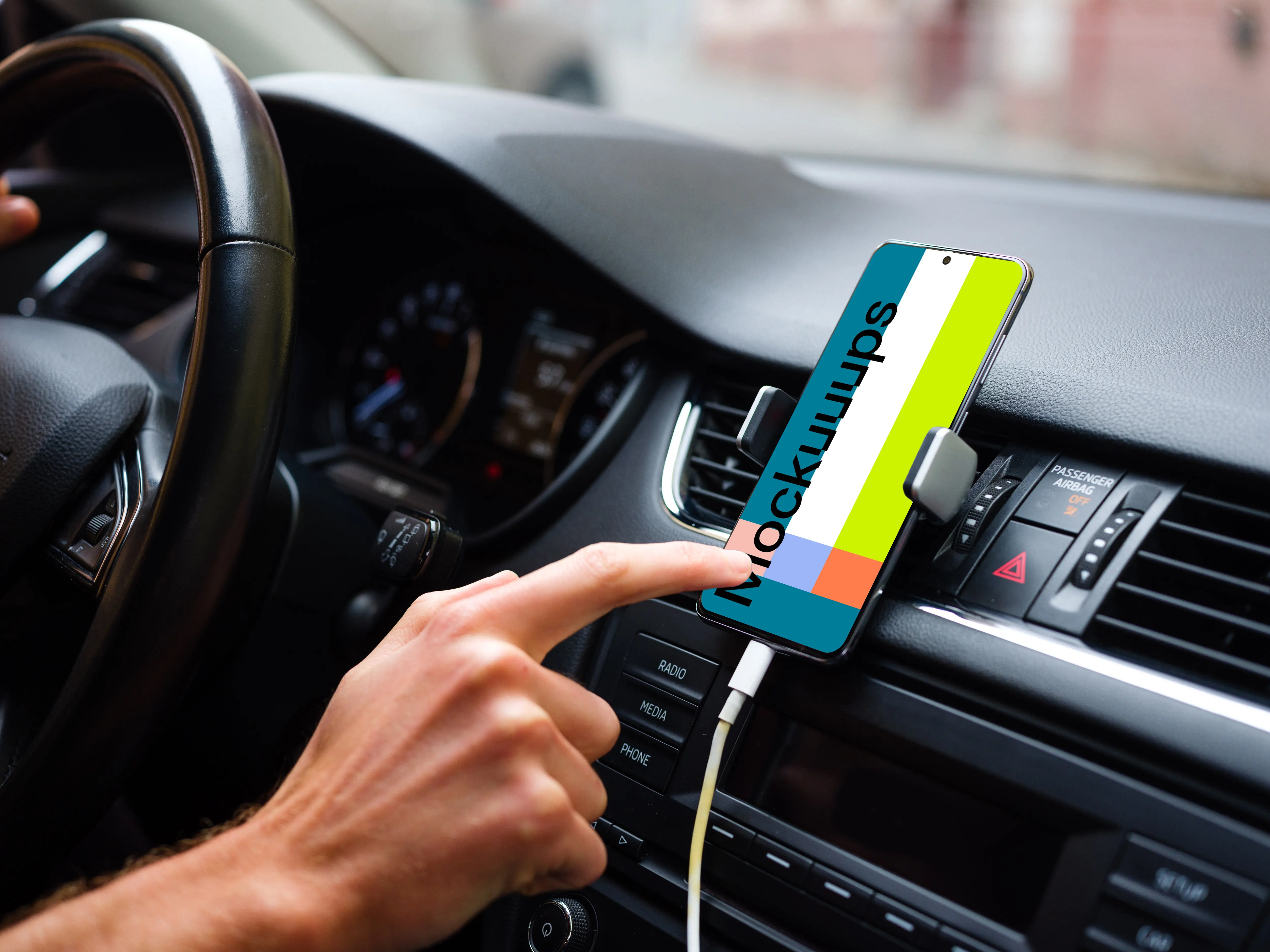 Driver tapping Samsung S20 mockup mounted on car dashboard
