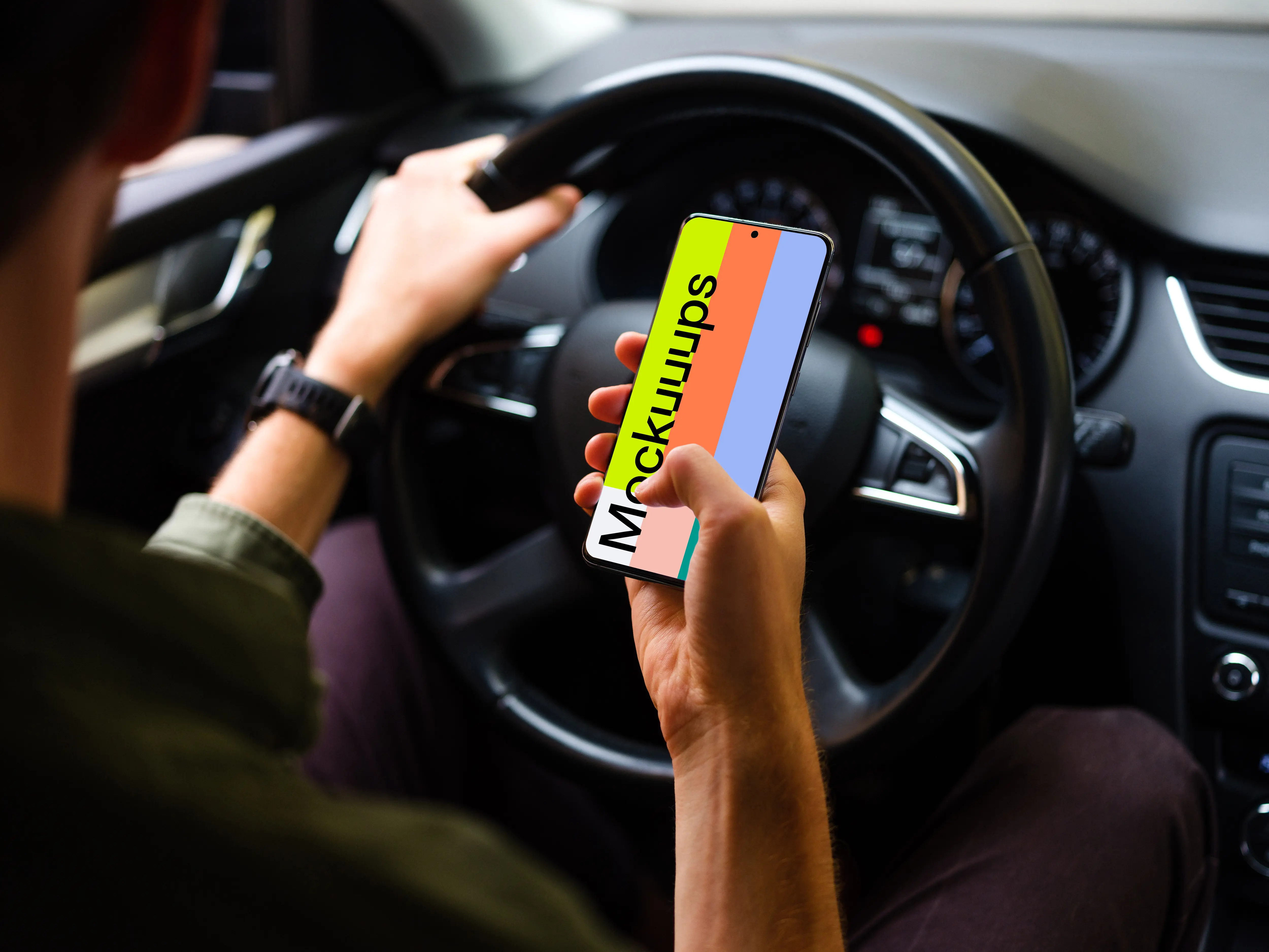 Driver tapping Samsung S20 mockup with hand on the wheel