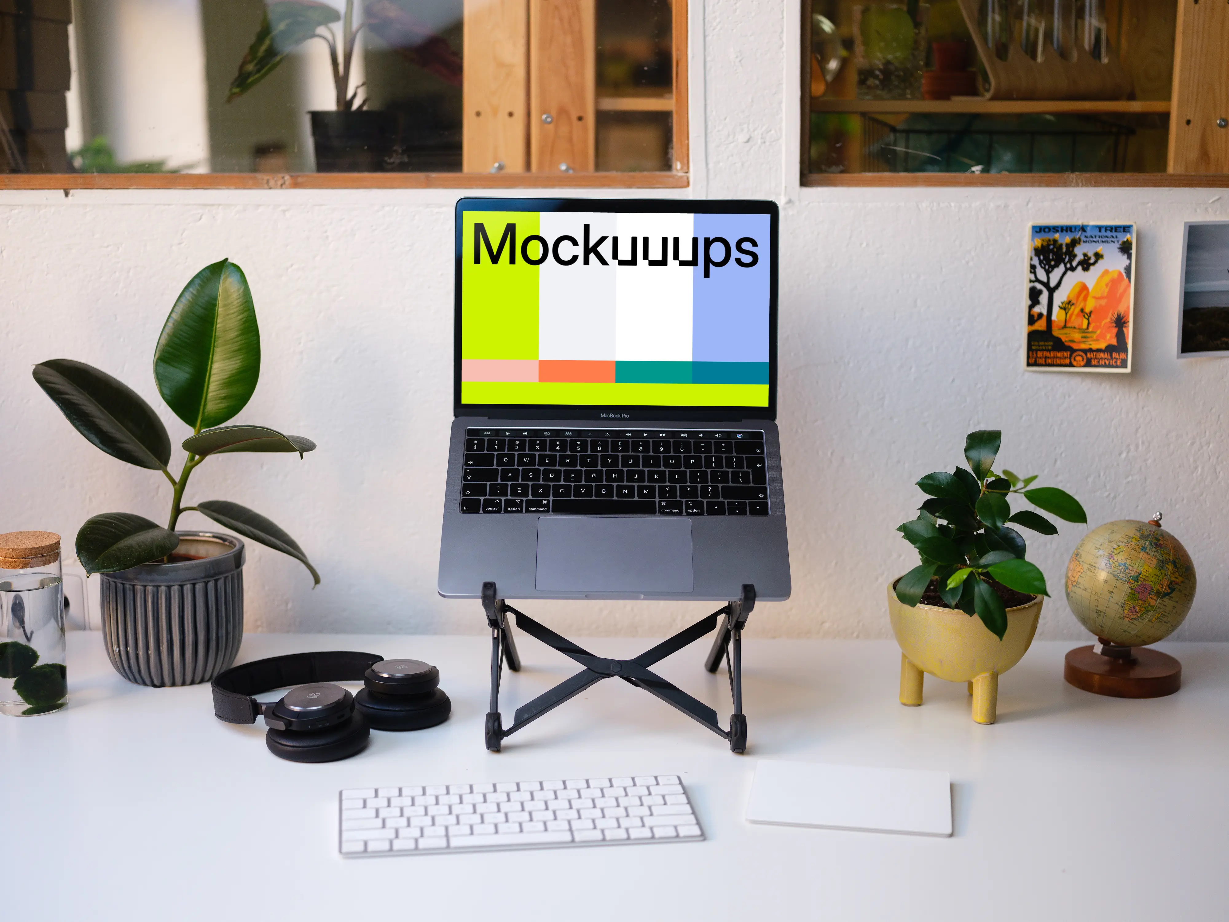 Front view of the Macbook Pro mockup on the stand