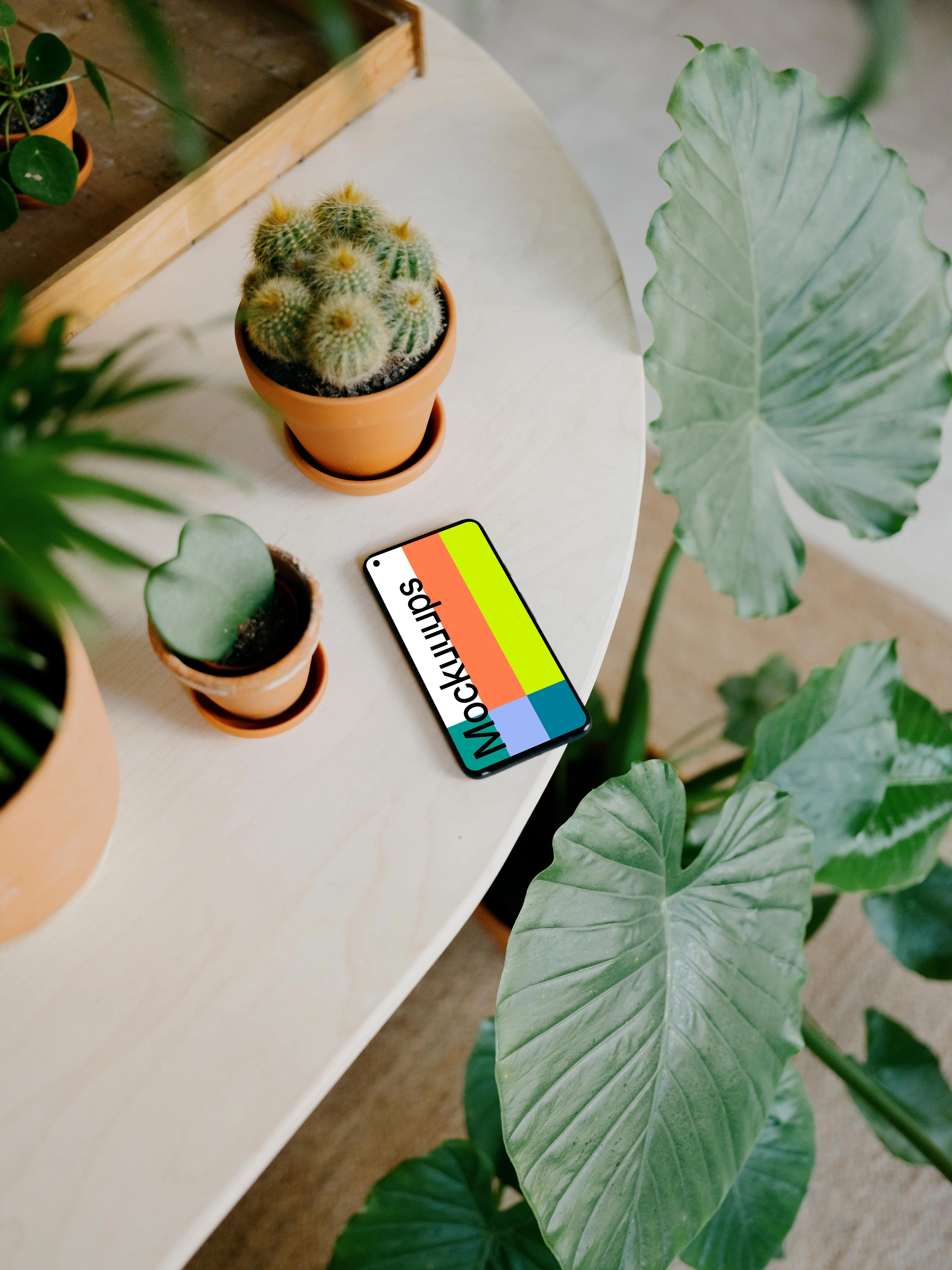 Google Pixel 5 mockup placed at the edge of a table