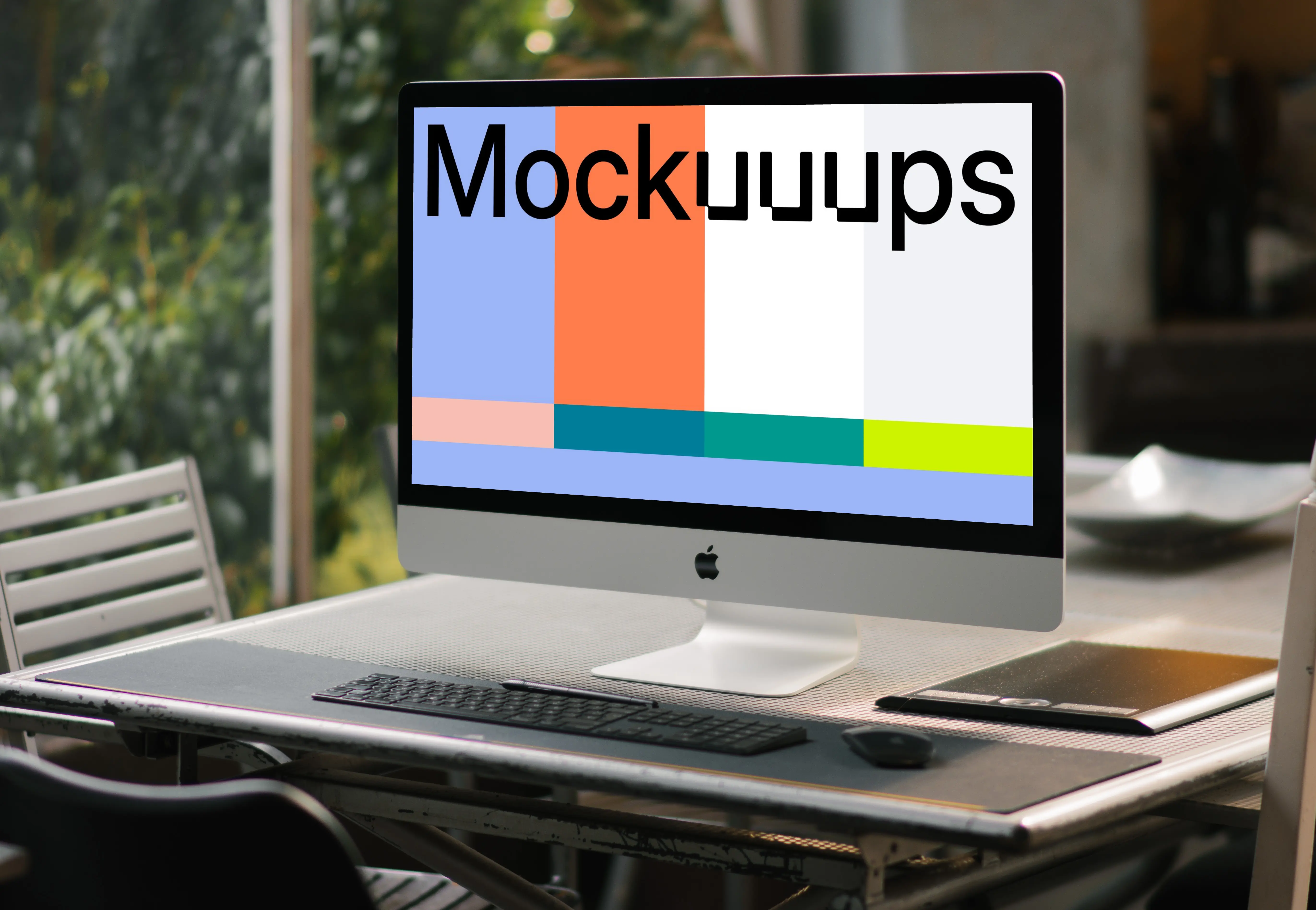 iMac mockup on a conference table