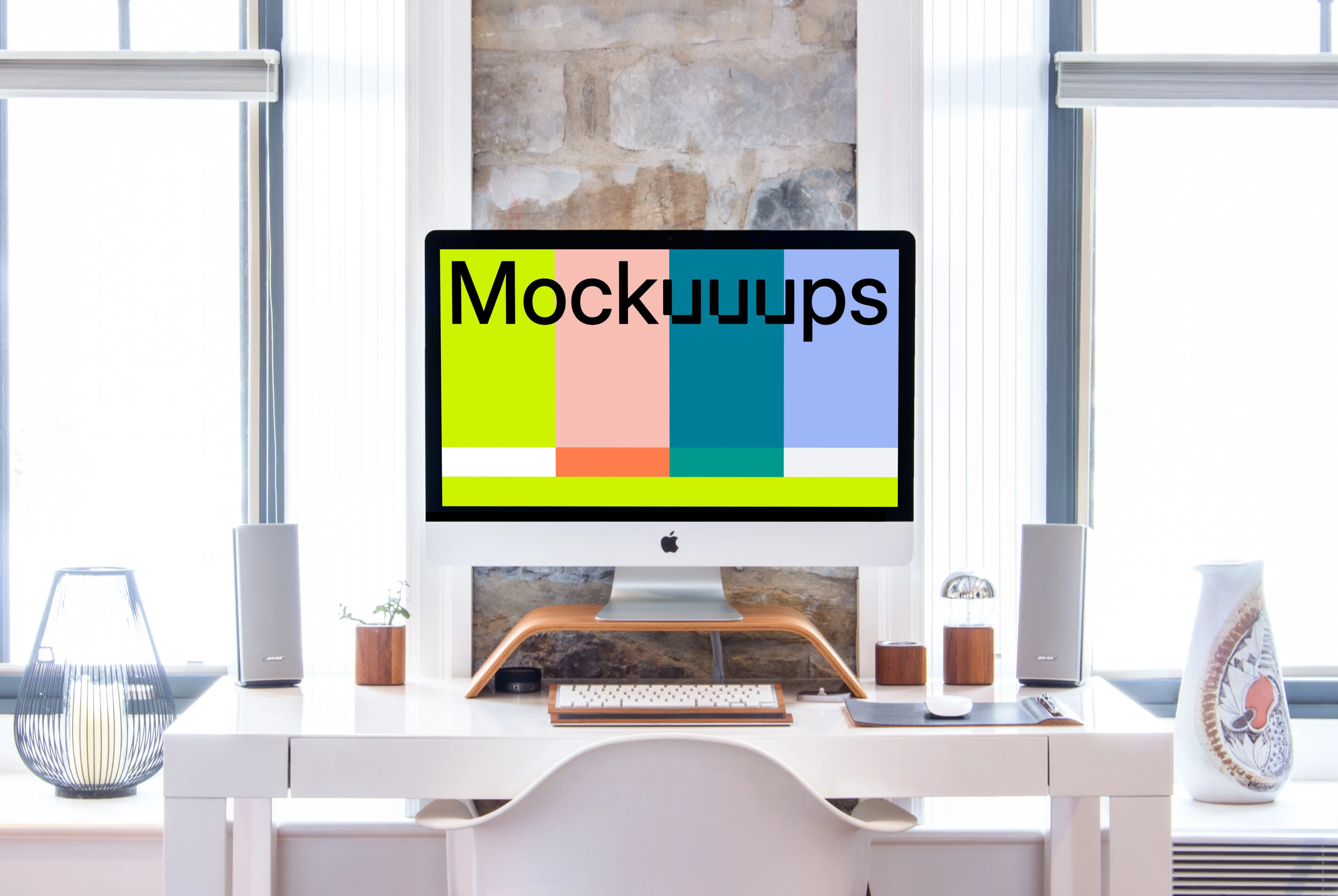 iMac mockup on a table with a keyboard and a mouse 