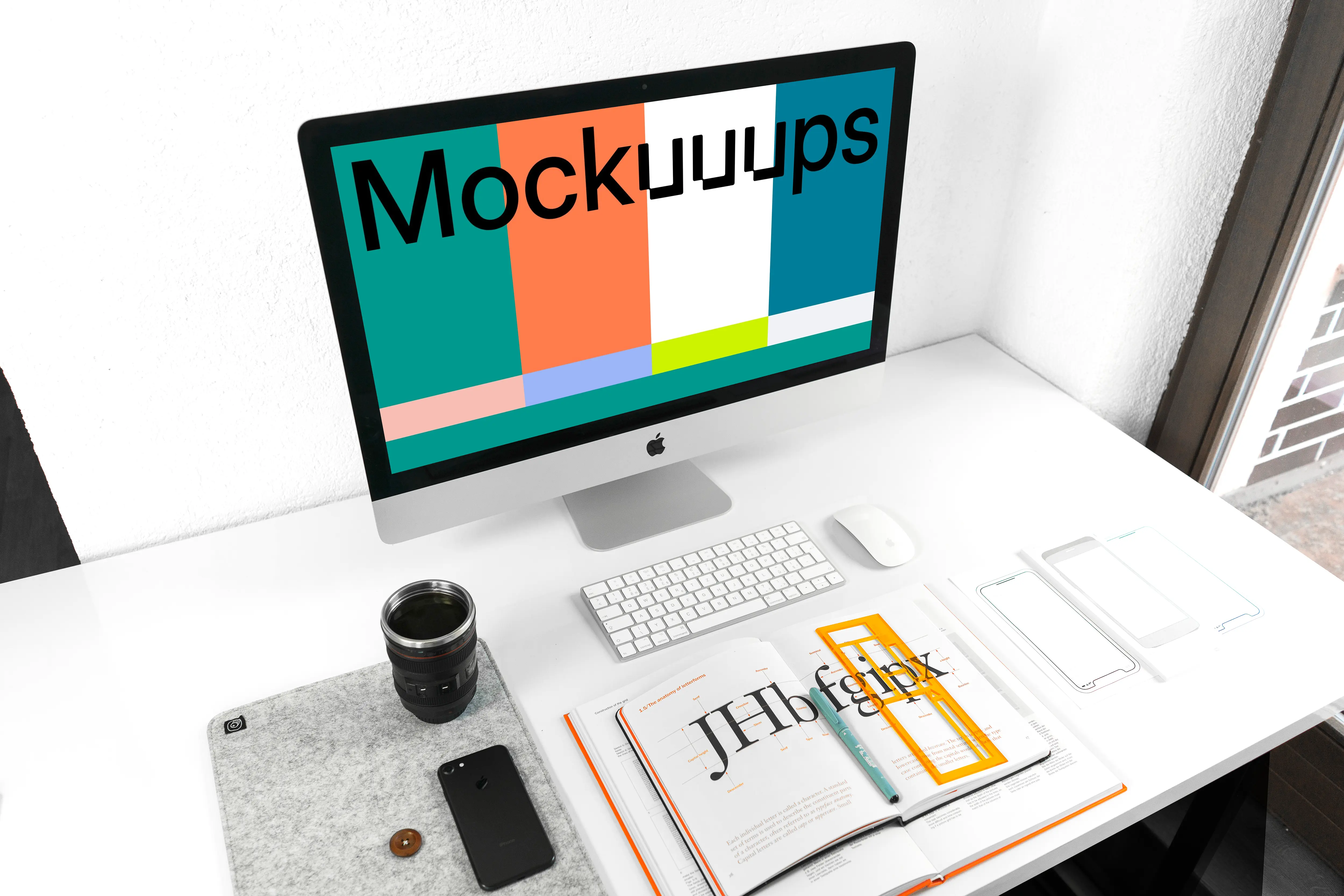iMac mockup on white working desk
