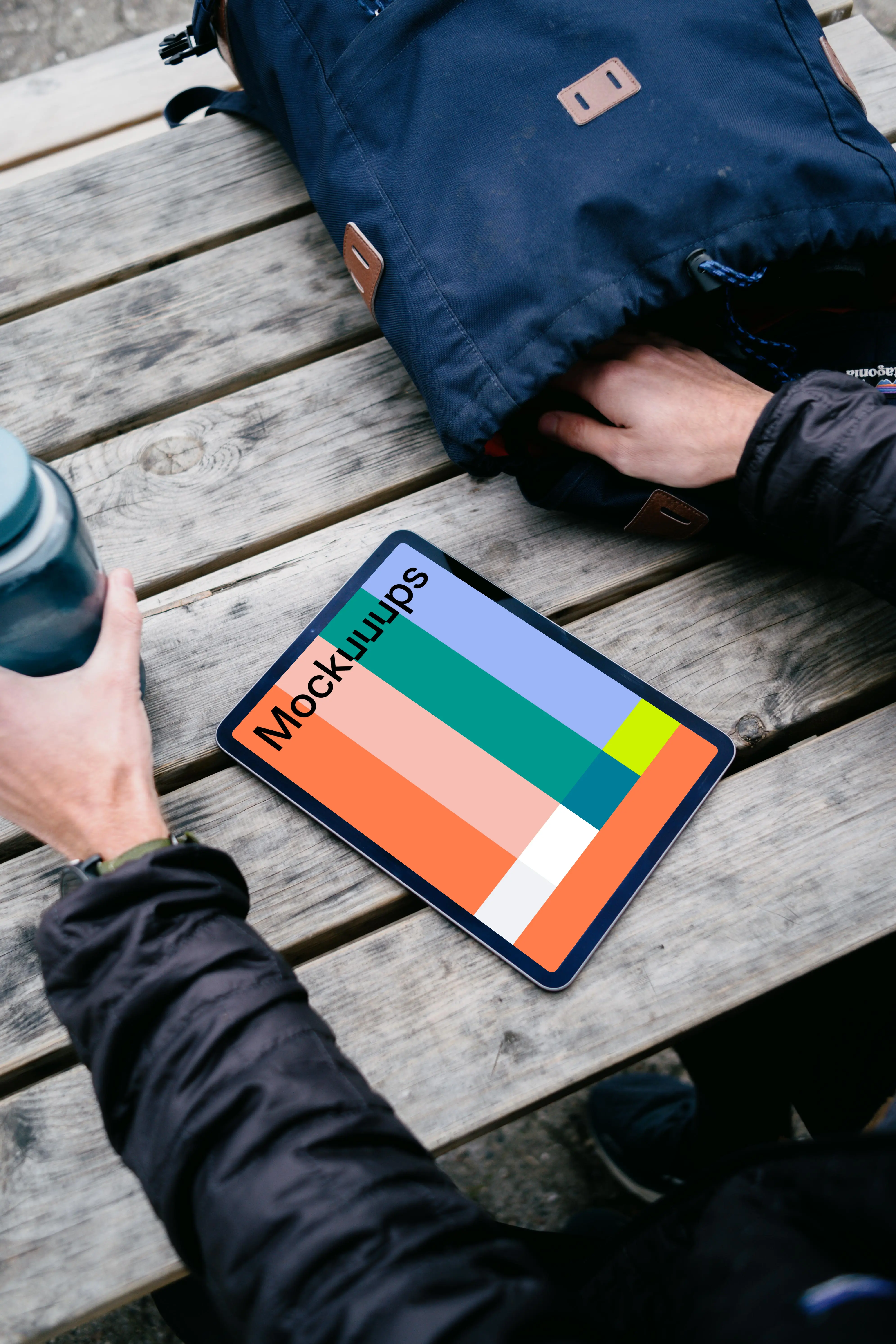 iPad Air mockup help by a use outdoors 