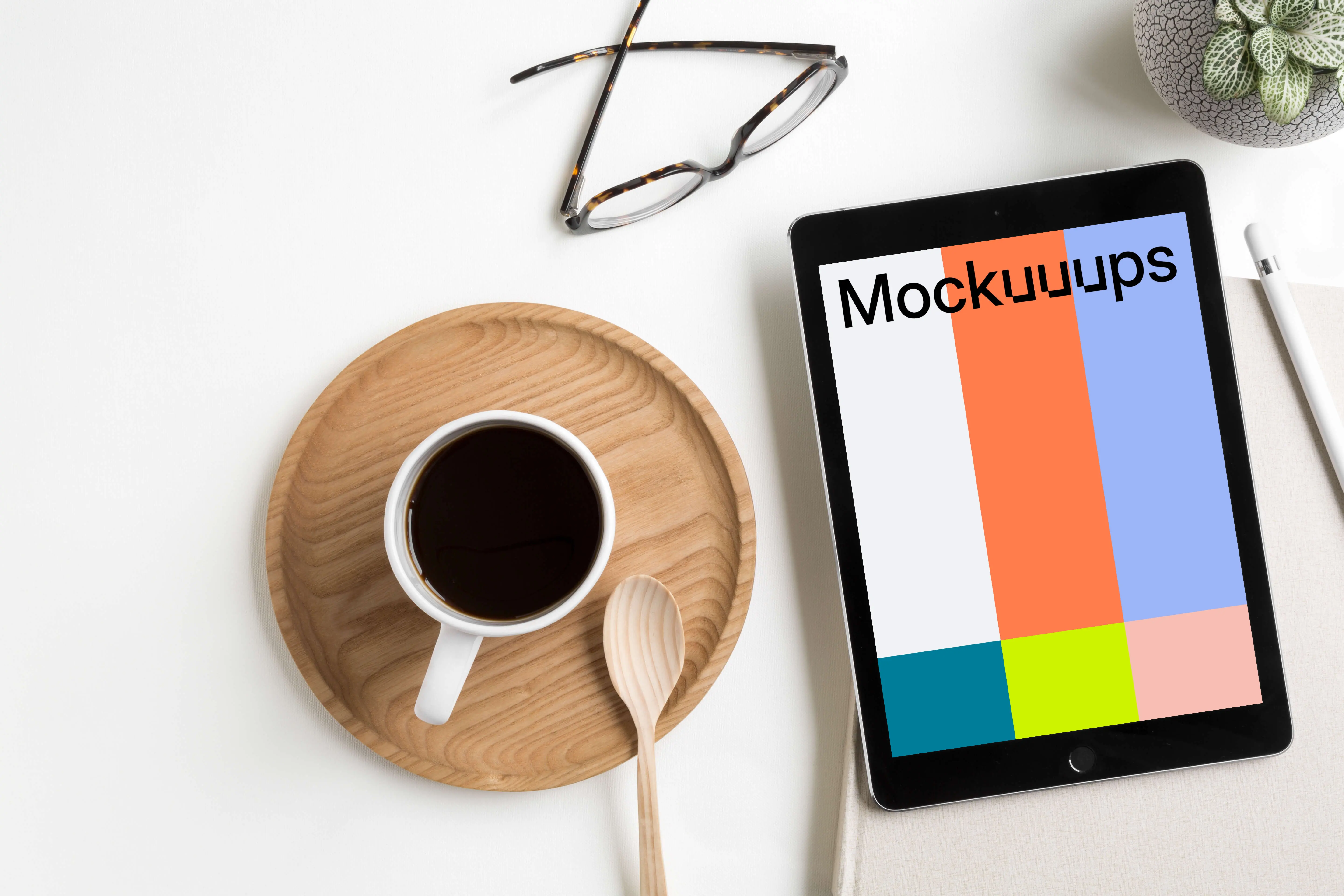 Free iPad Pro mockup on white table