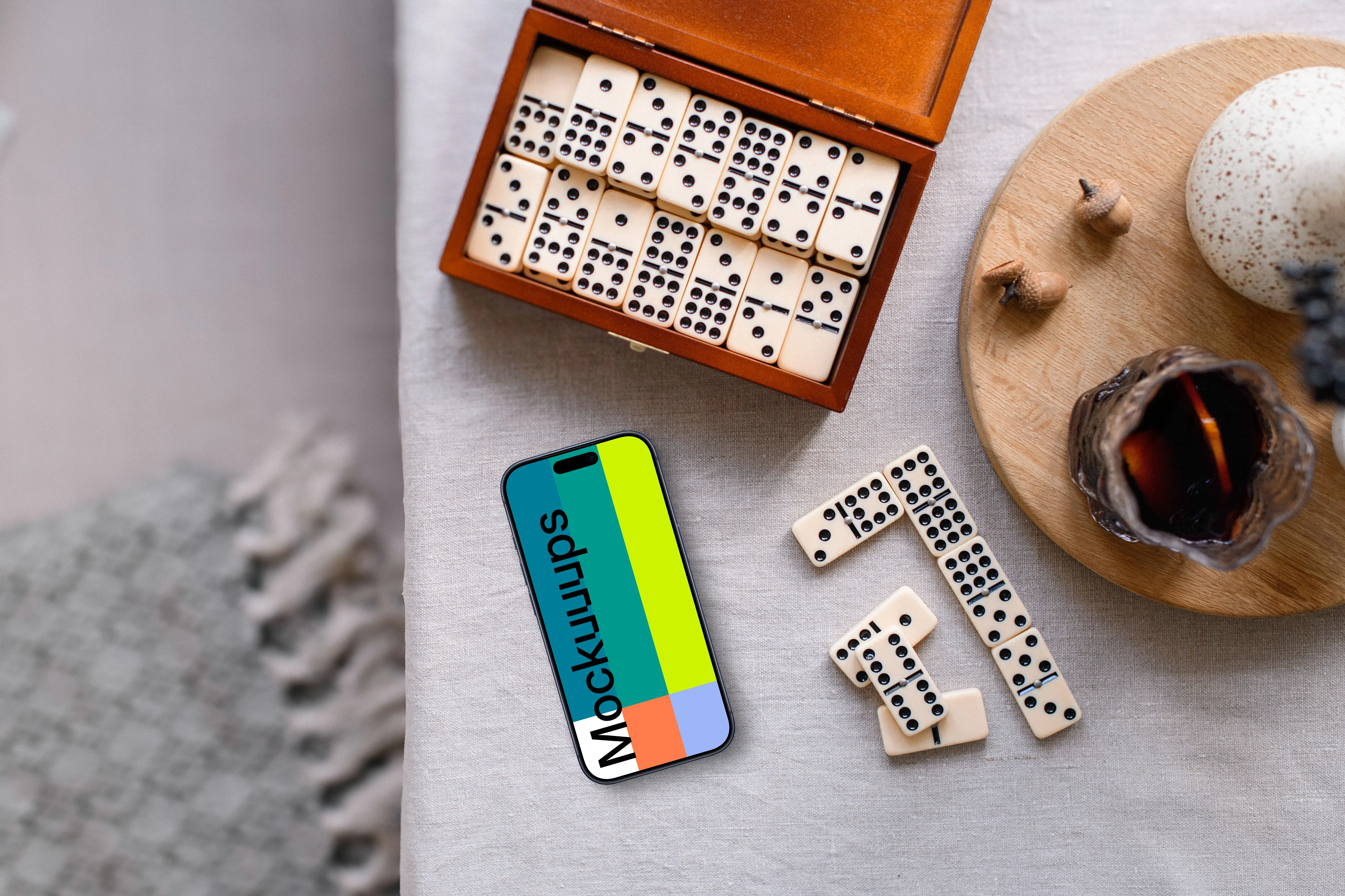iPhone mockup and dominoes