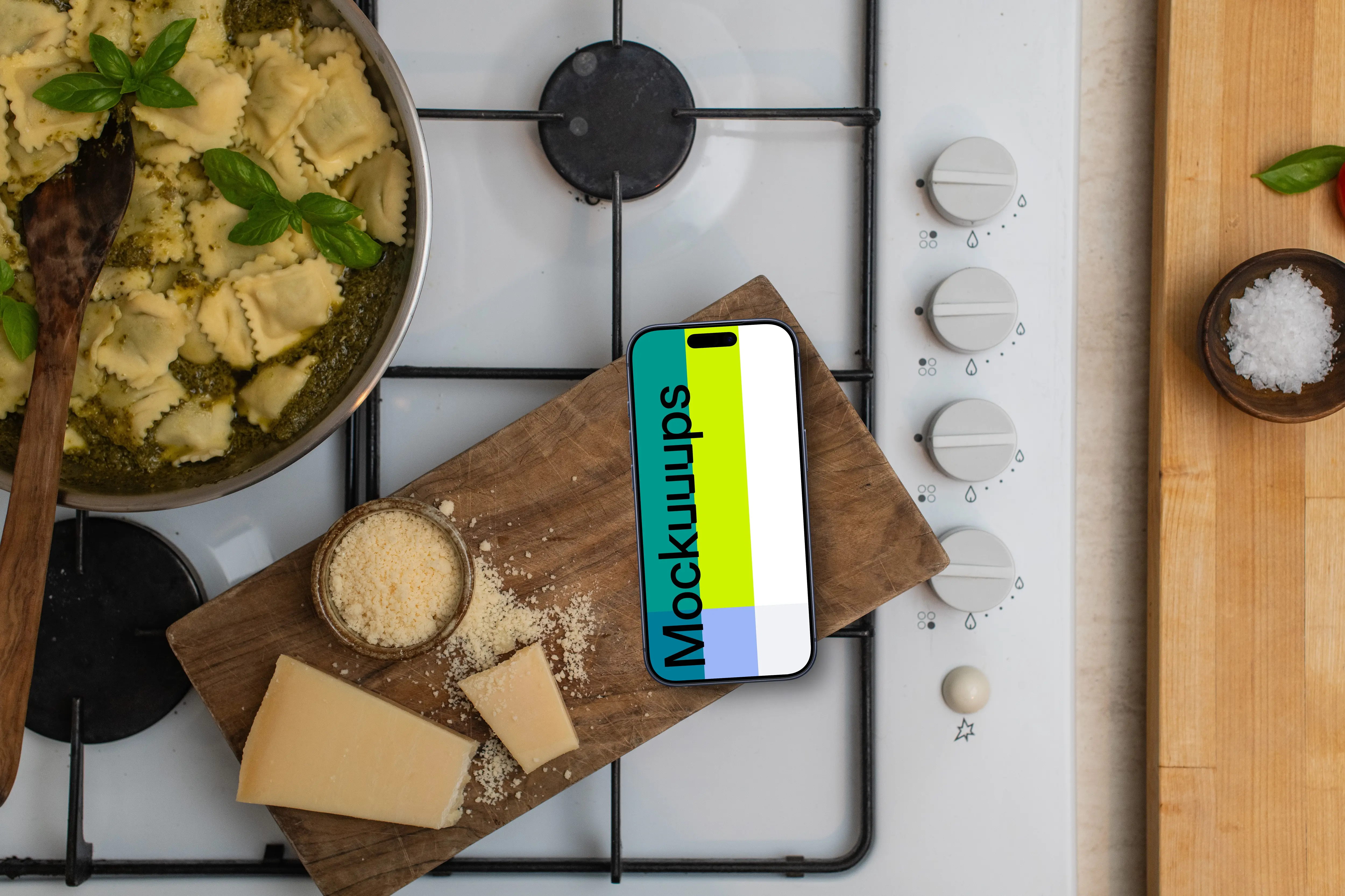 iPhone on wooden cutting board with cheese
