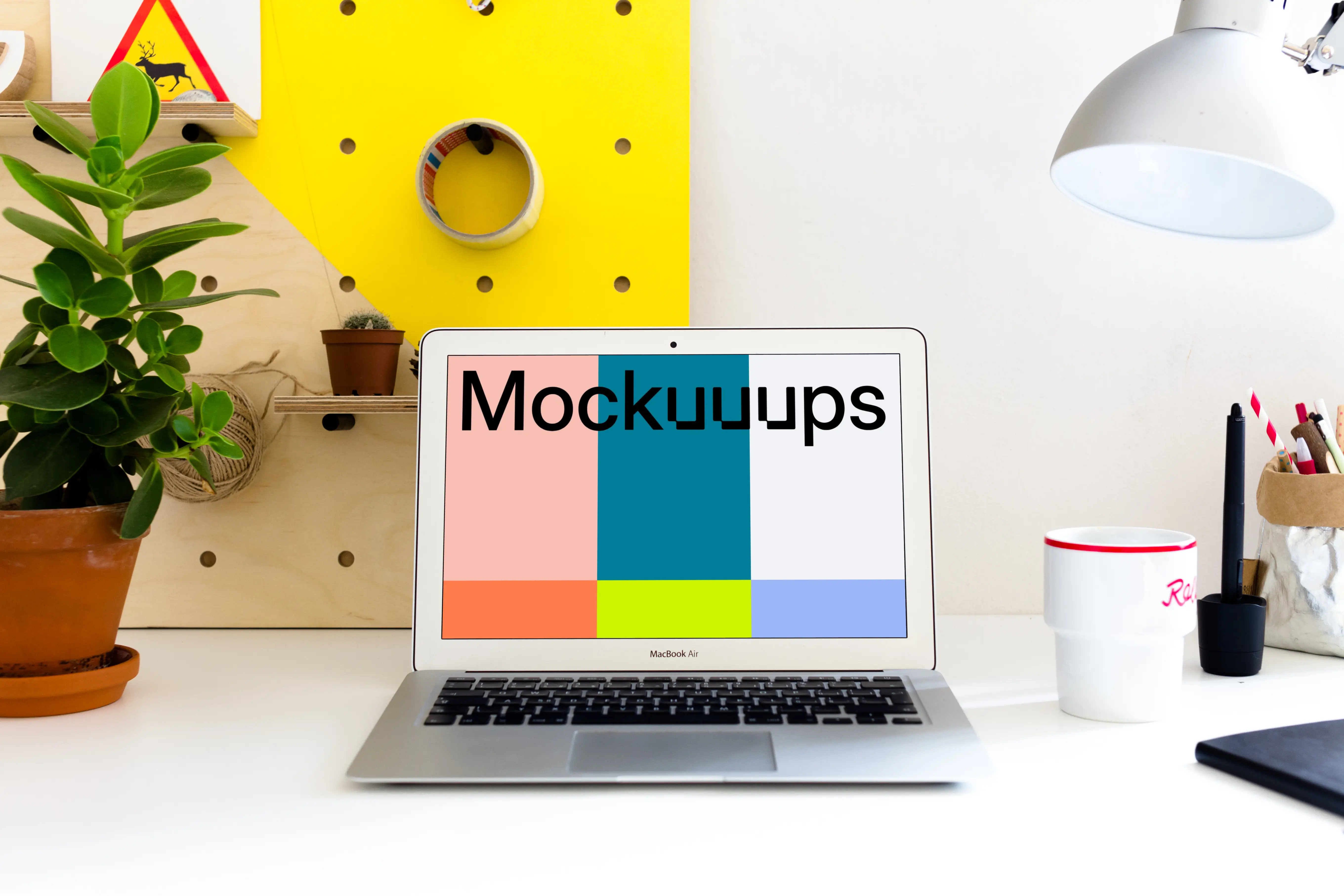 MacBook Air mockup at bright office