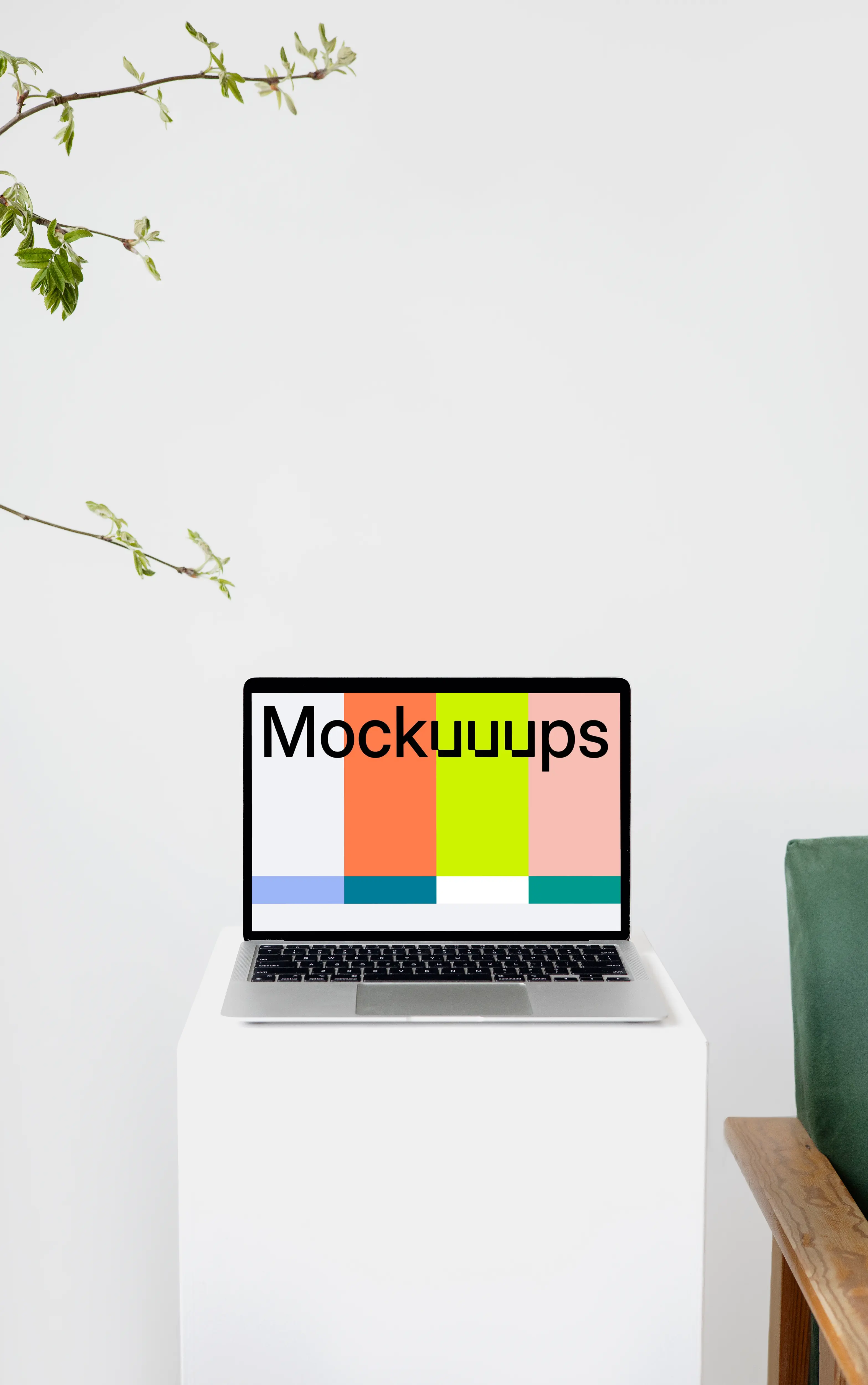 MacBook mockup on a tall white stool with wooden chair arm on the side