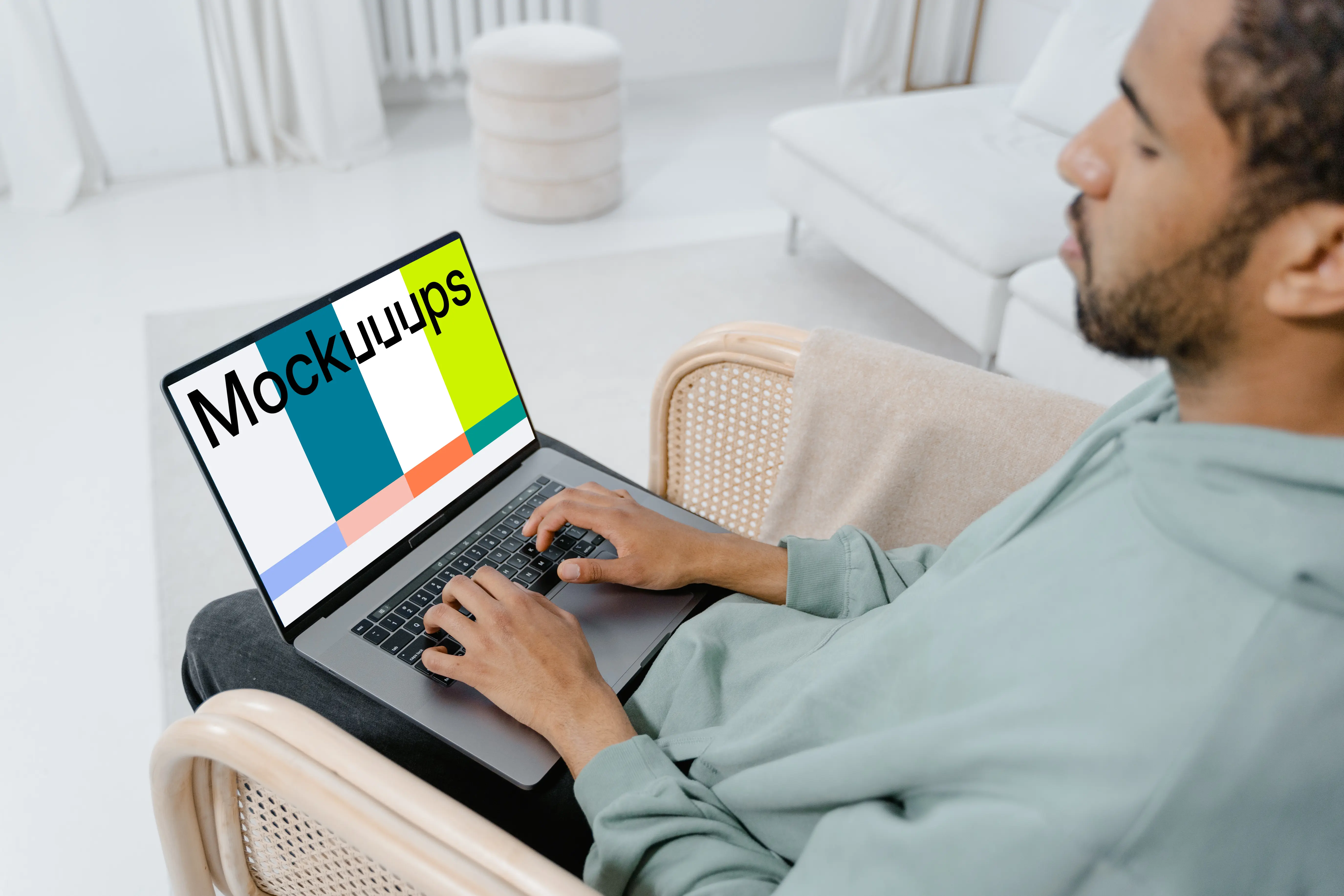 MacBook mockup on a user’s lap